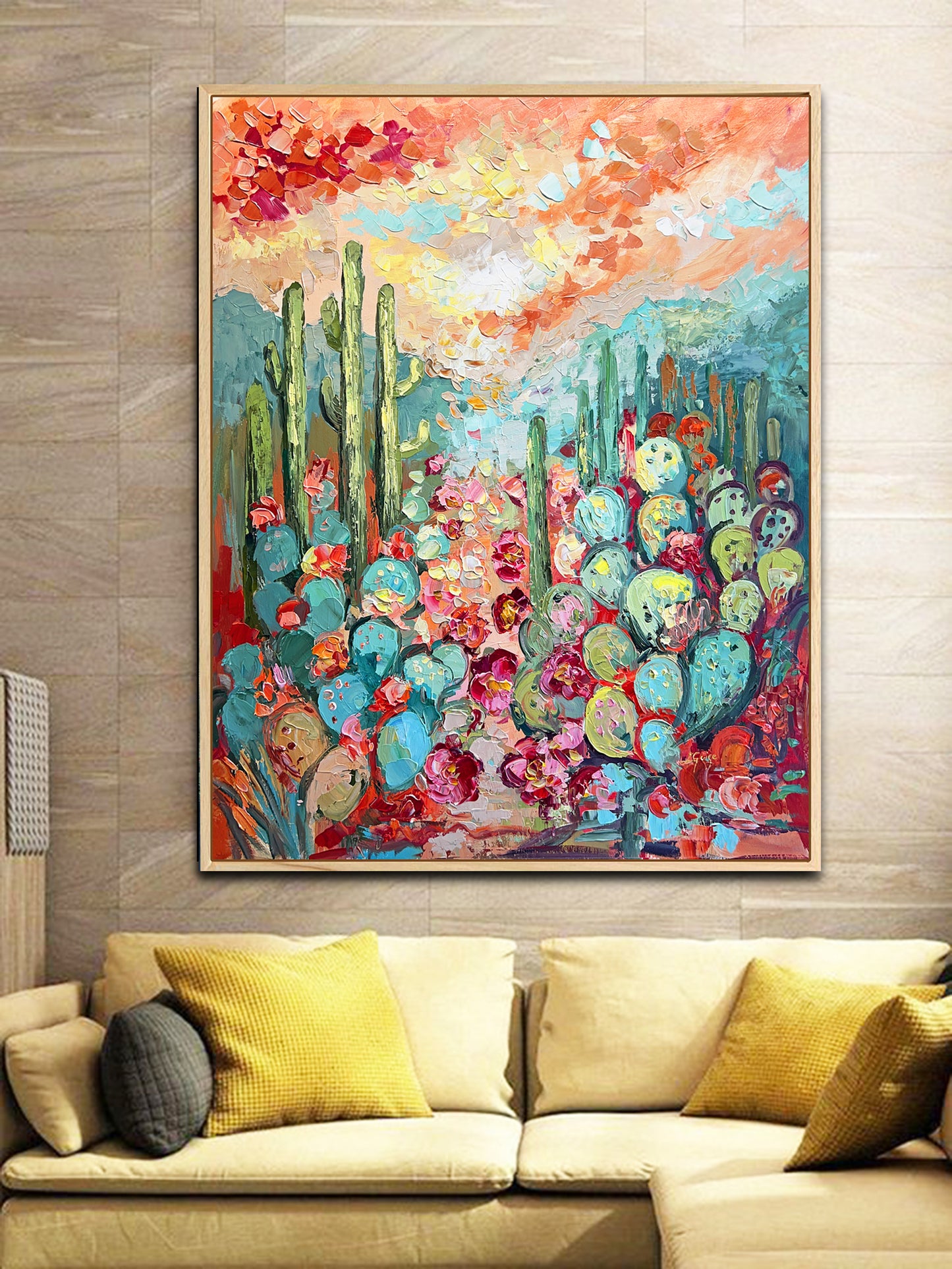 a living room with a couch and a painting on the wall