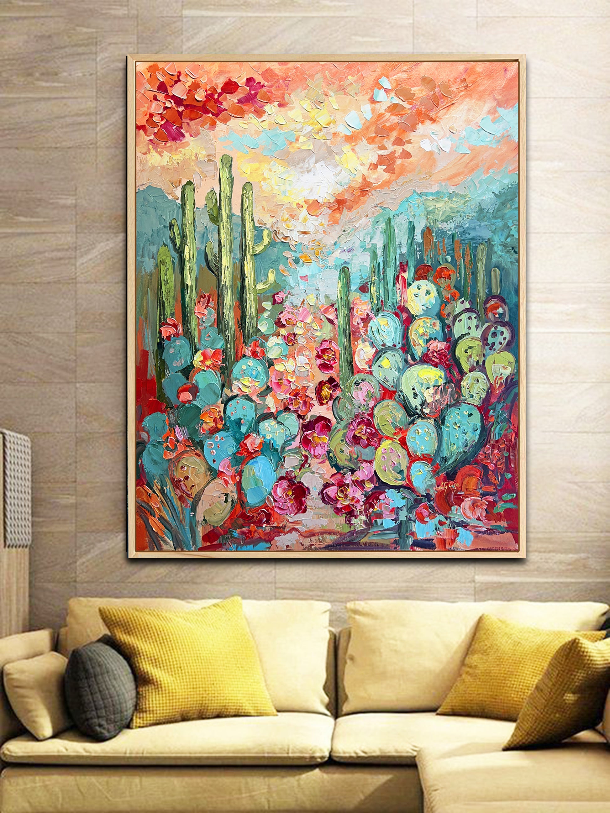 a living room with a couch and a painting on the wall