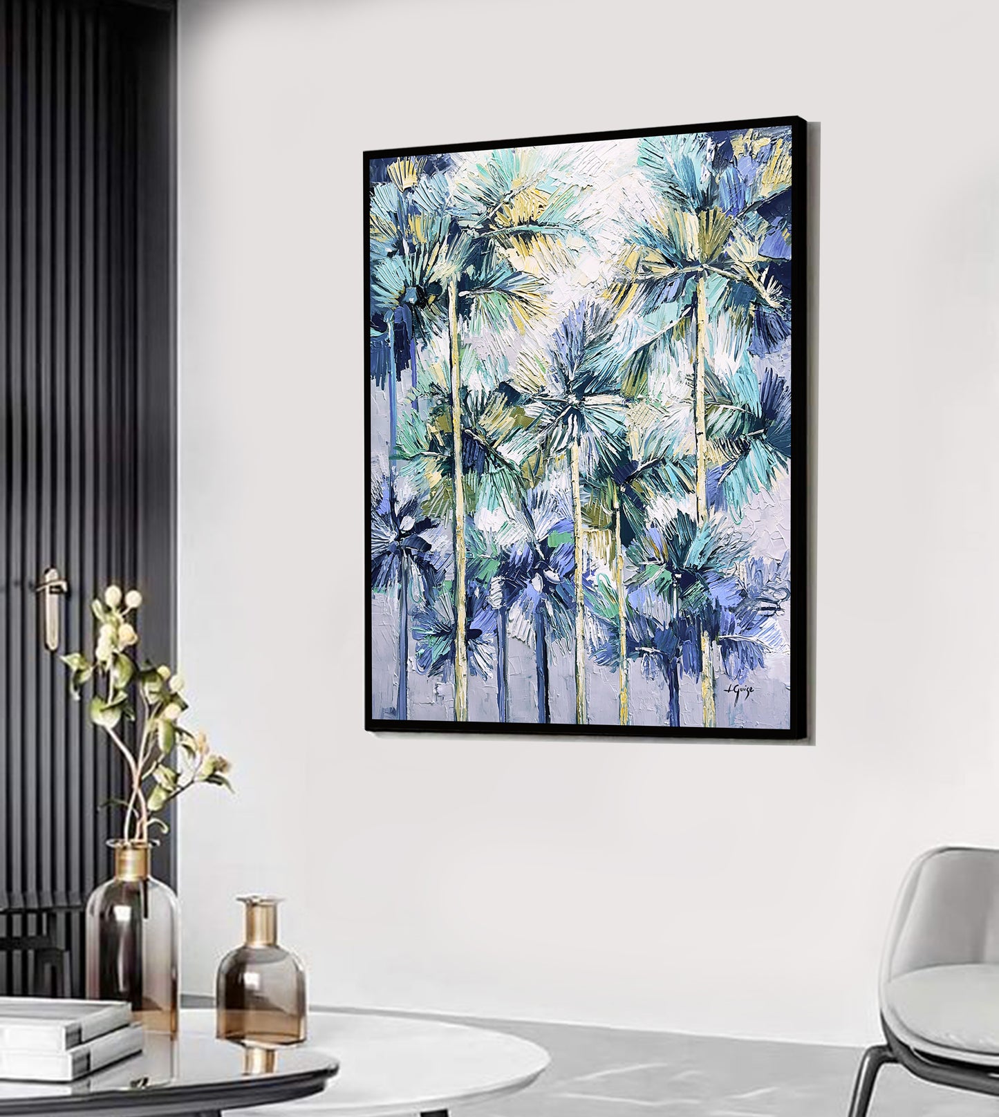 a painting hanging on a wall above a table