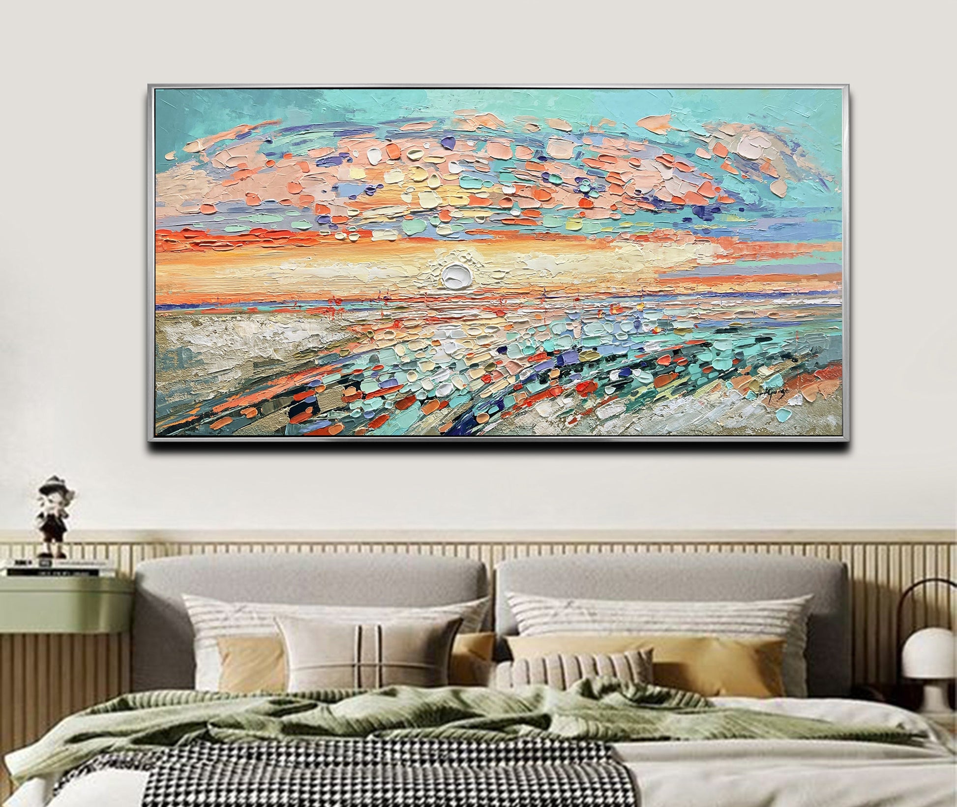 a bedroom with a bed and a painting on the wall