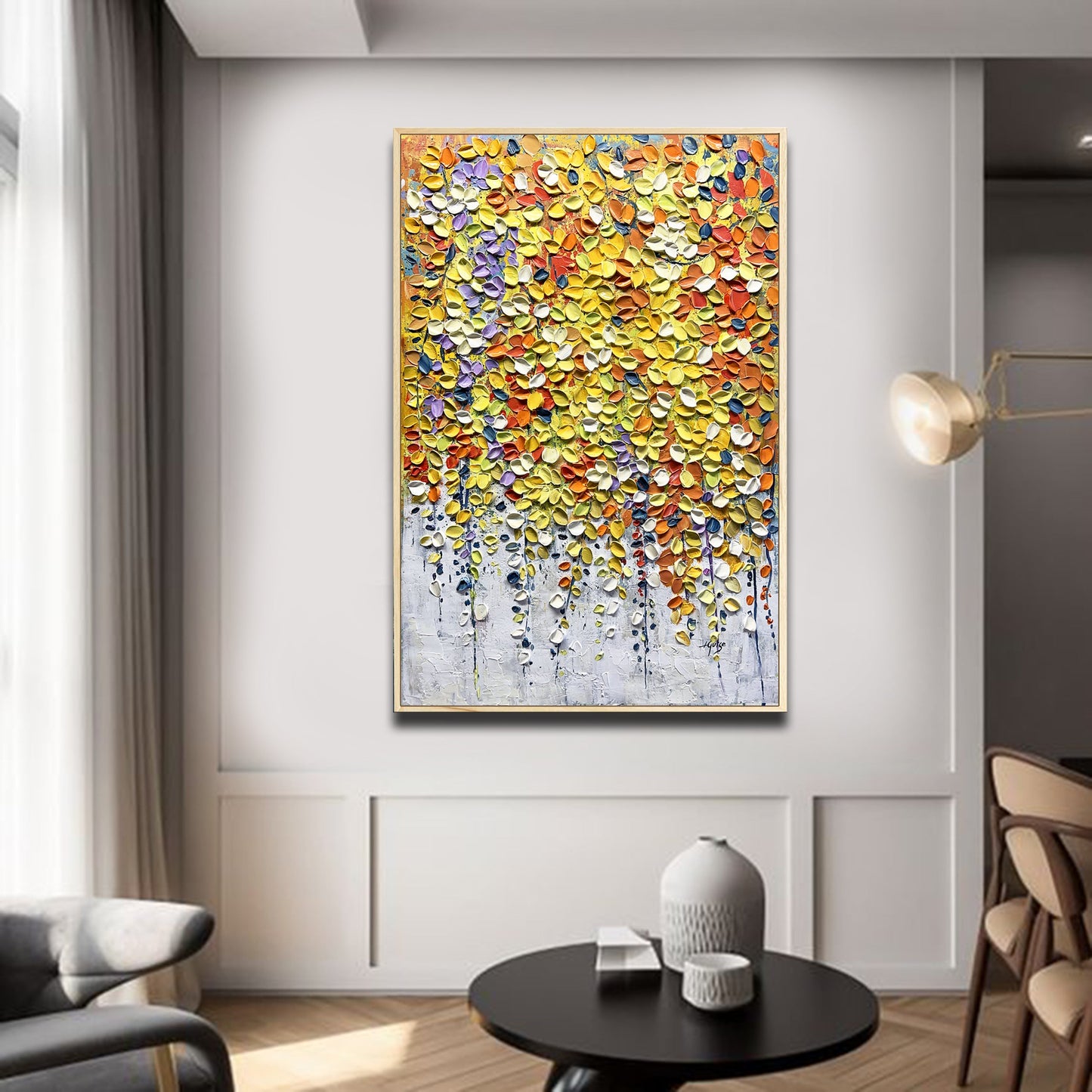 a living room with a large painting on the wall
