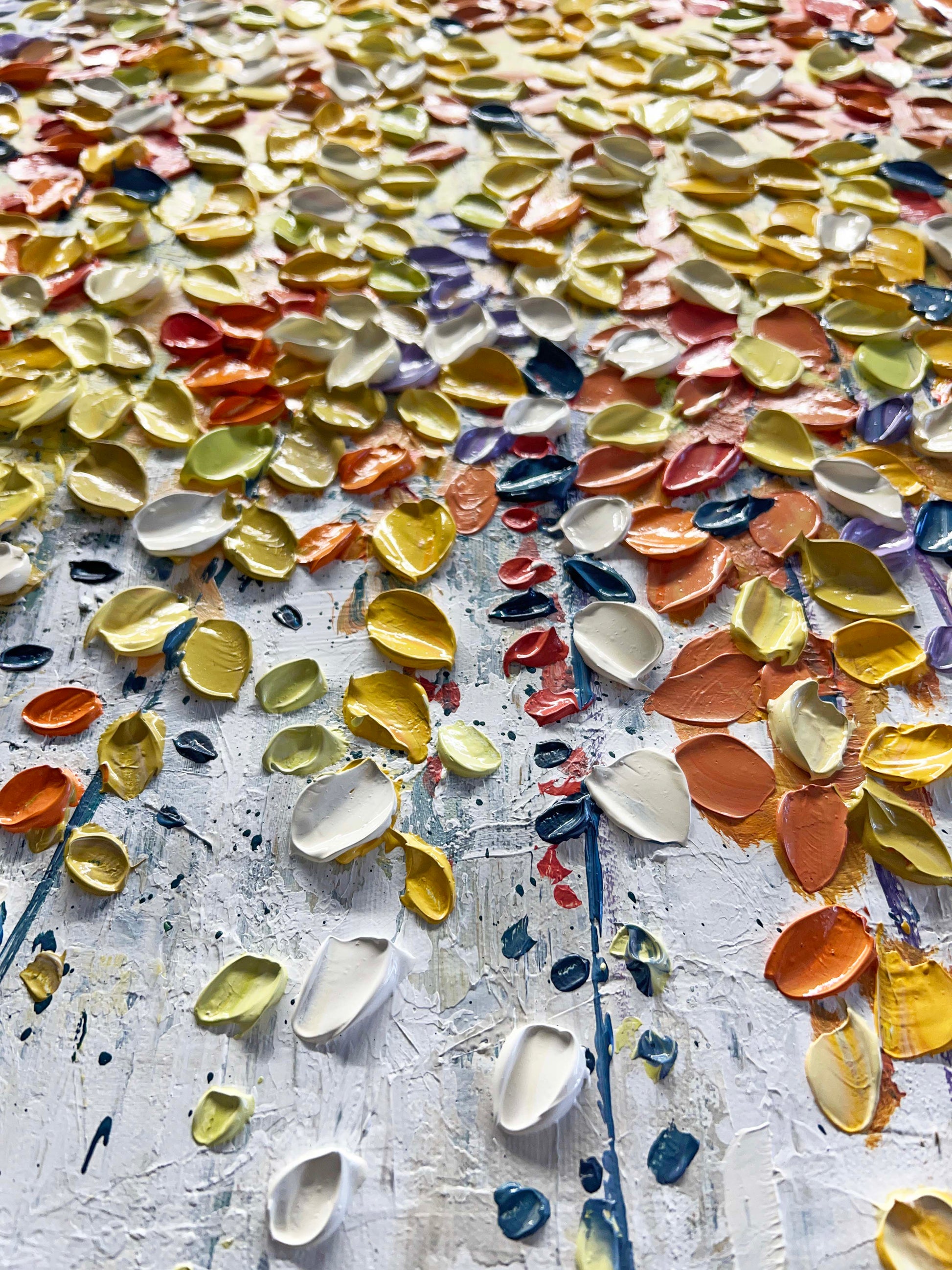 a table with a lot of different colored leaves on it