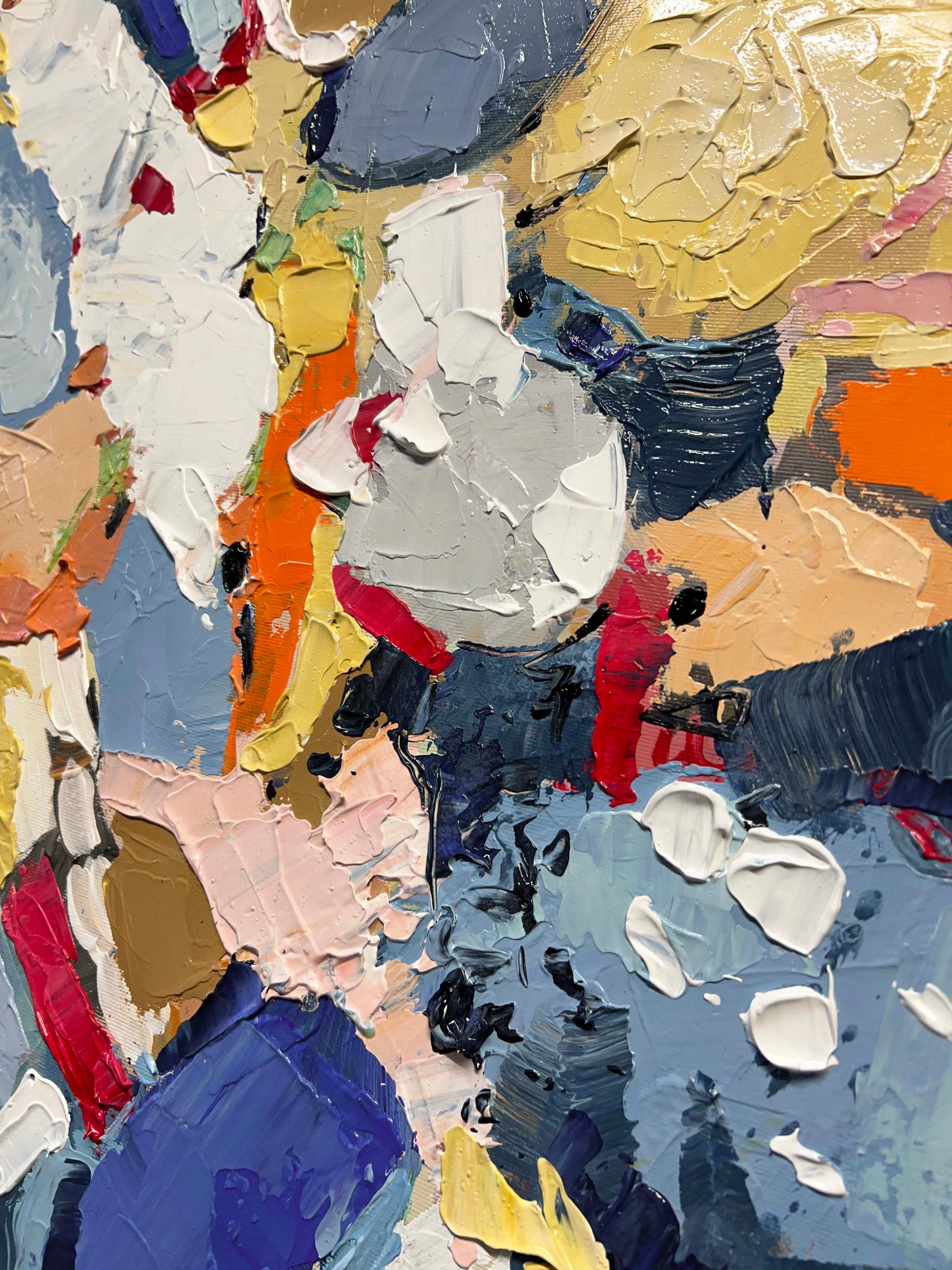 a close up of a painting with many colors of paint