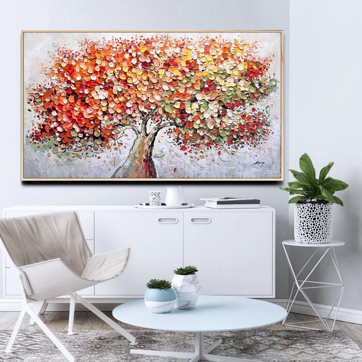 a living room with a painting on the wall