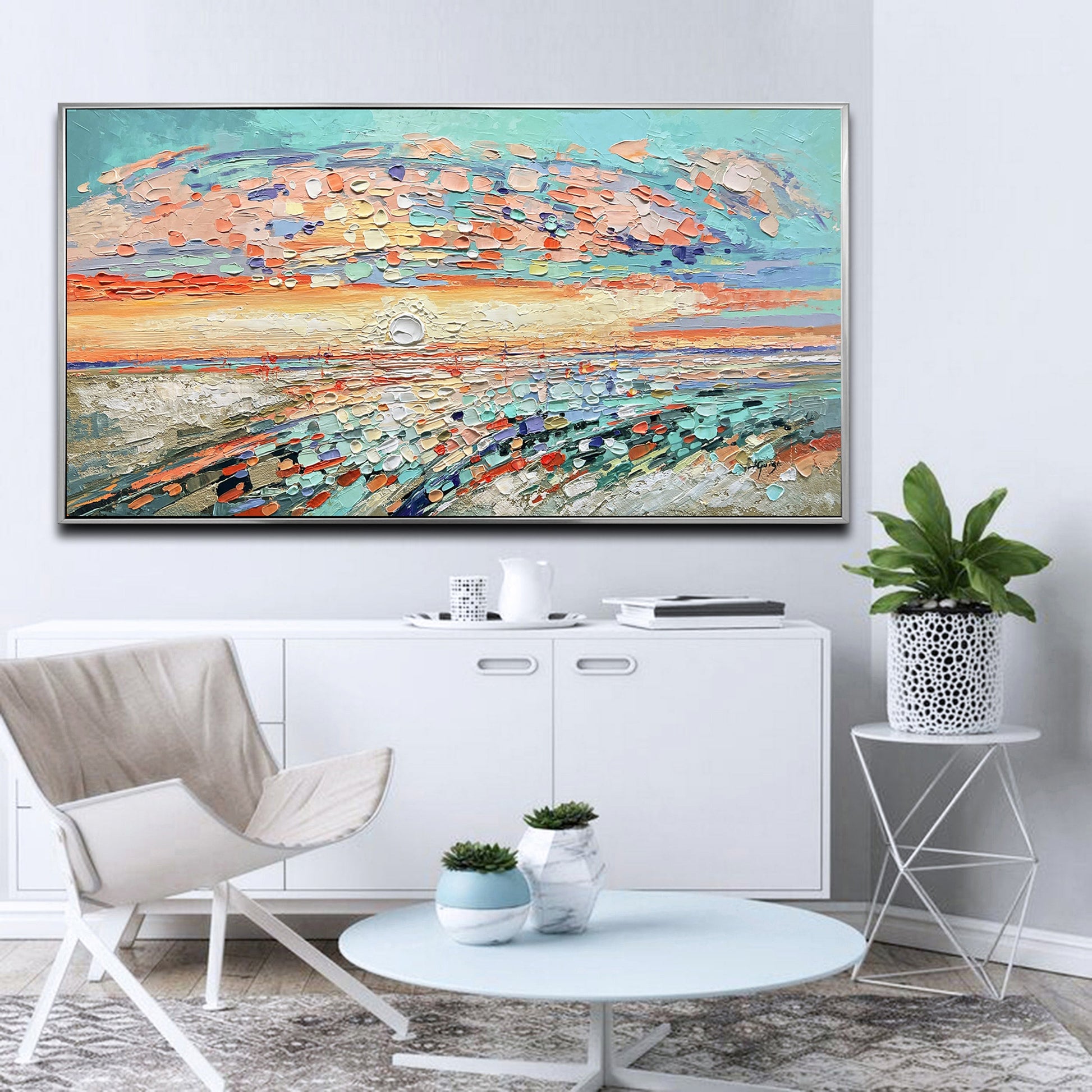 a living room with a large painting on the wall