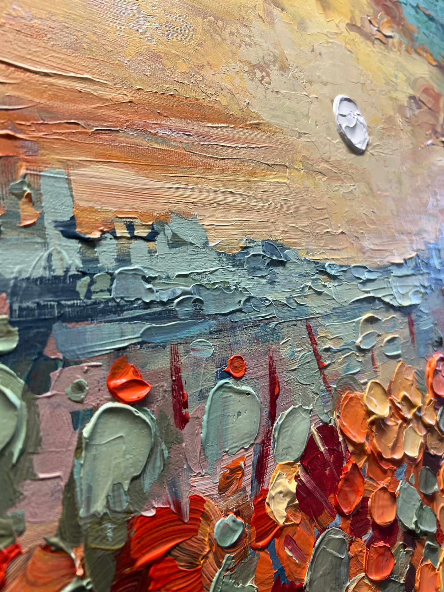 a painting of a group of people on a beach