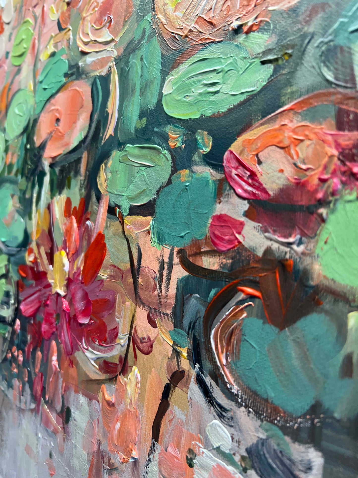 a close up of a painting with flowers on it