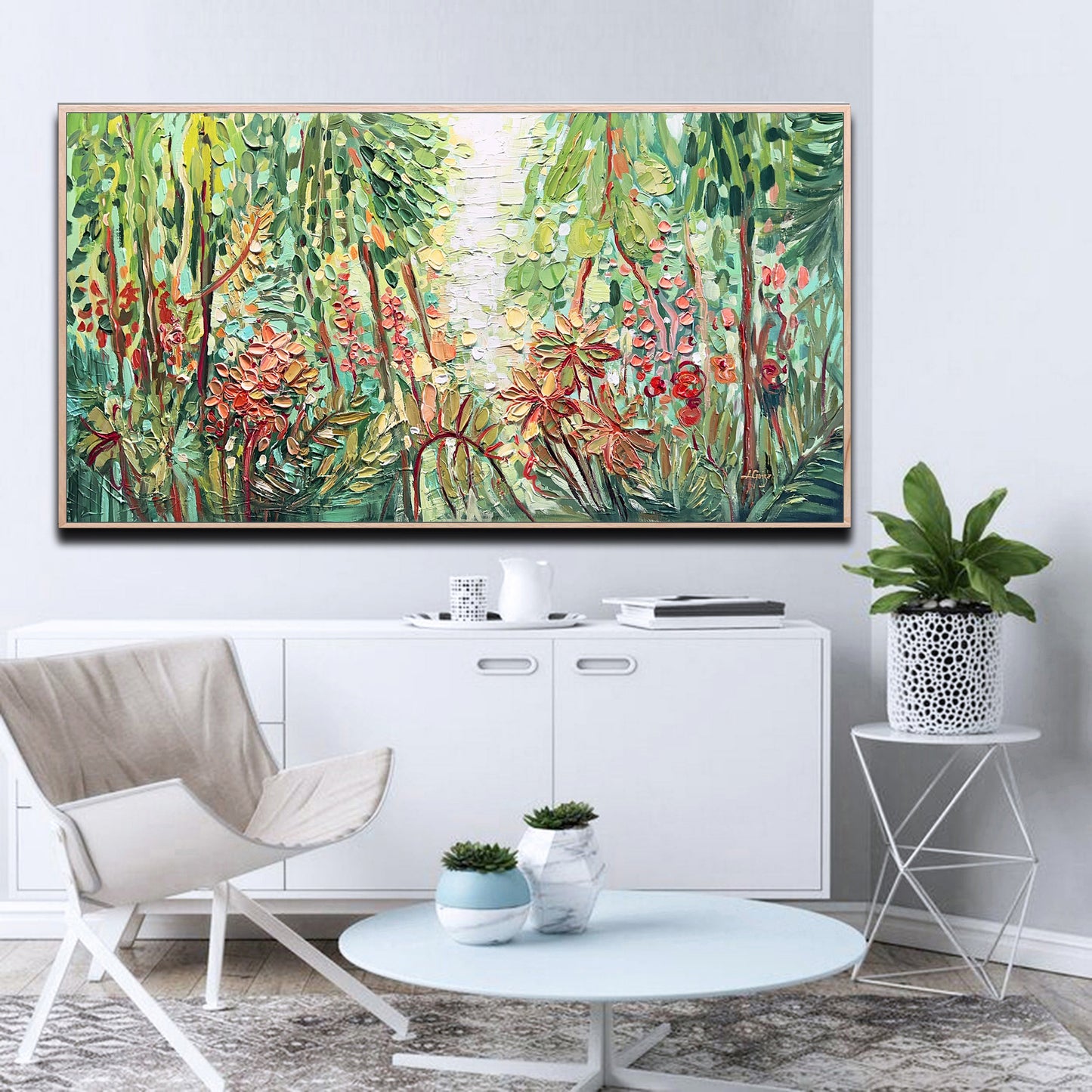 a living room with a painting on the wall