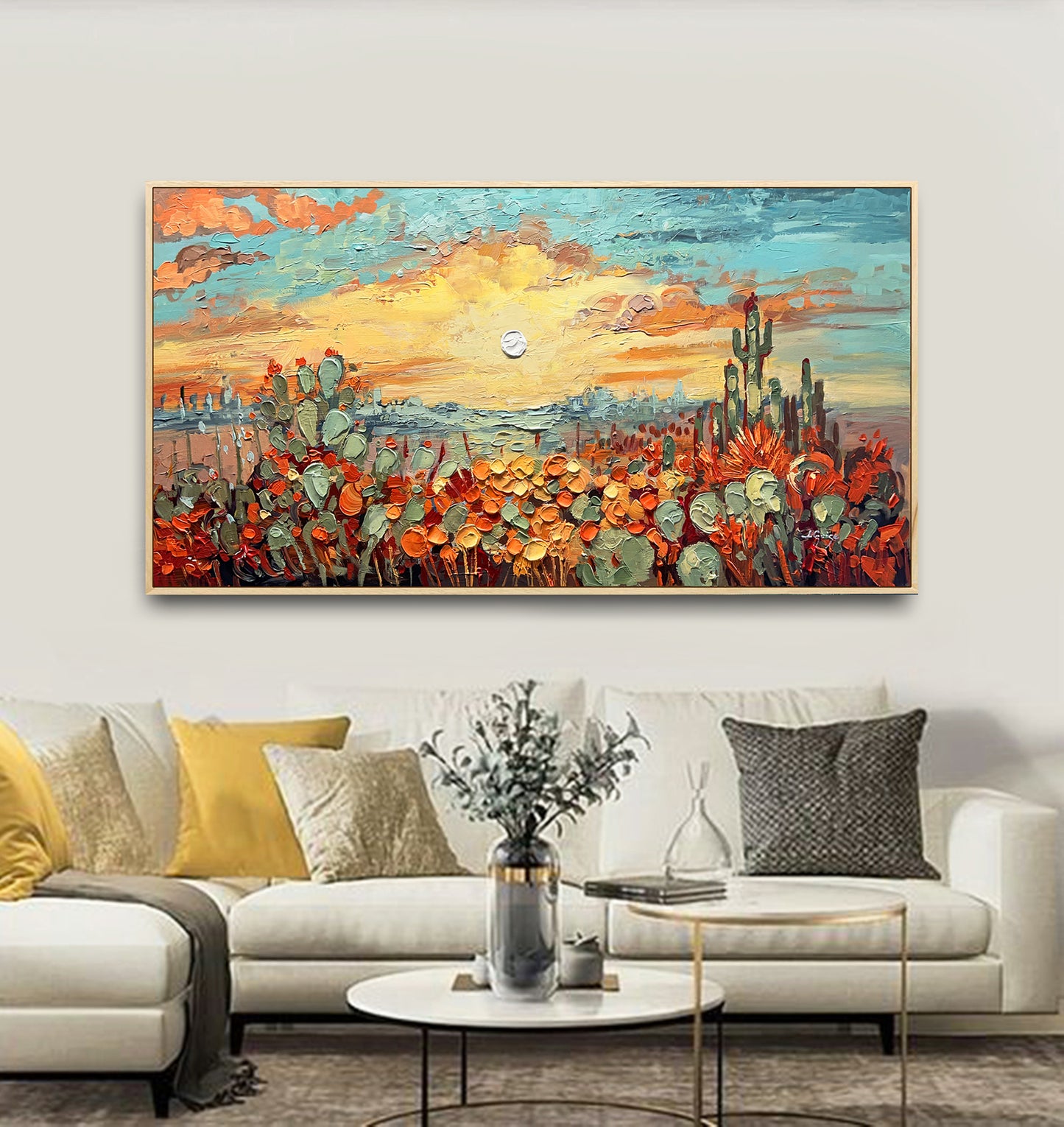 a living room with a couch and a painting on the wall