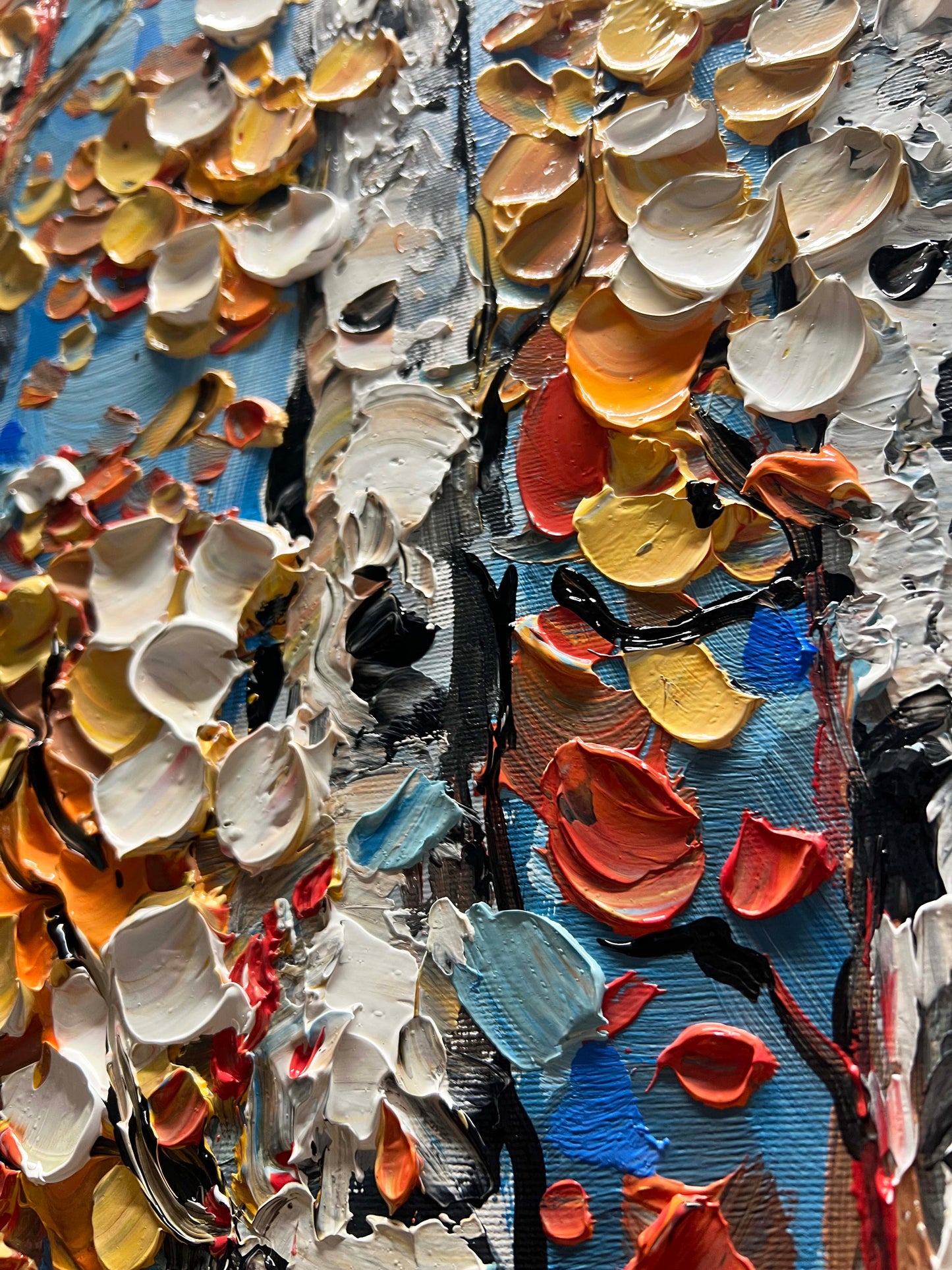 a close up of a colorful piece of art