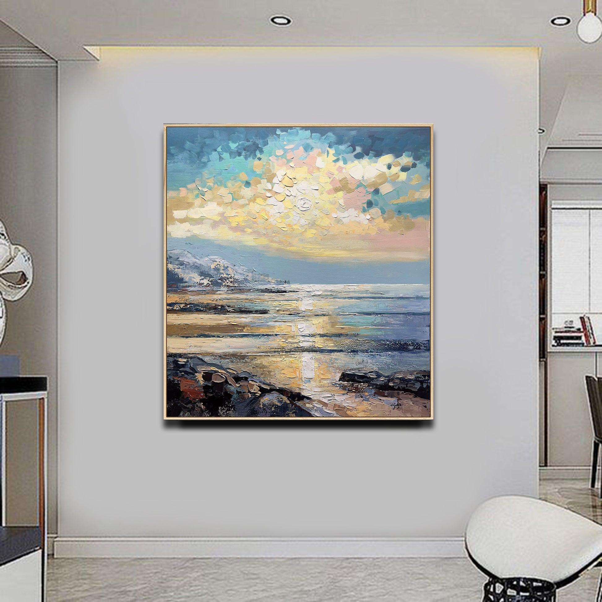 a living room with a painting on the wall