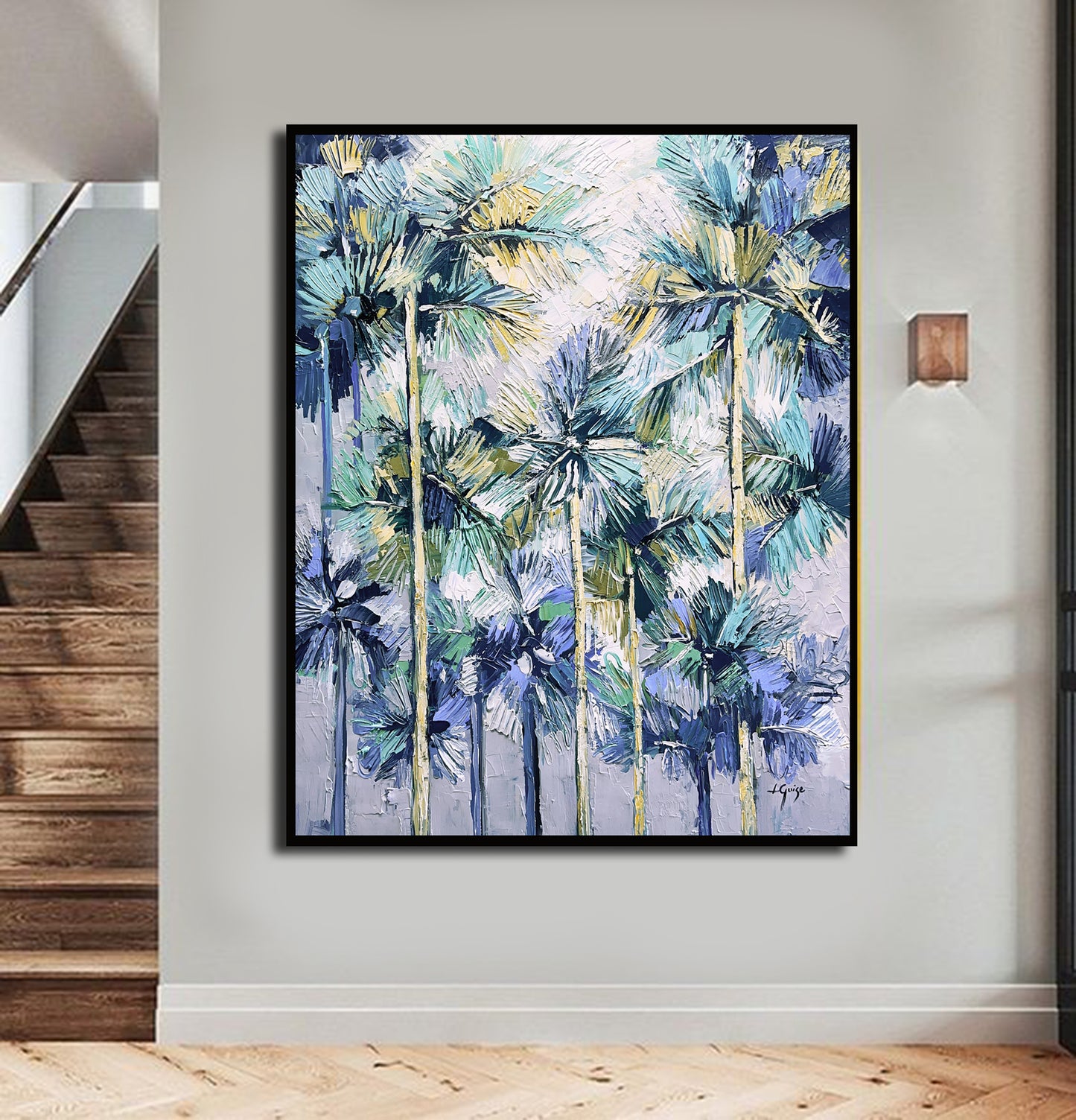 a painting hanging on a wall next to a stair case