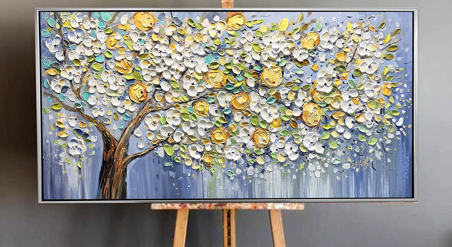 a painting of a tree on a easel