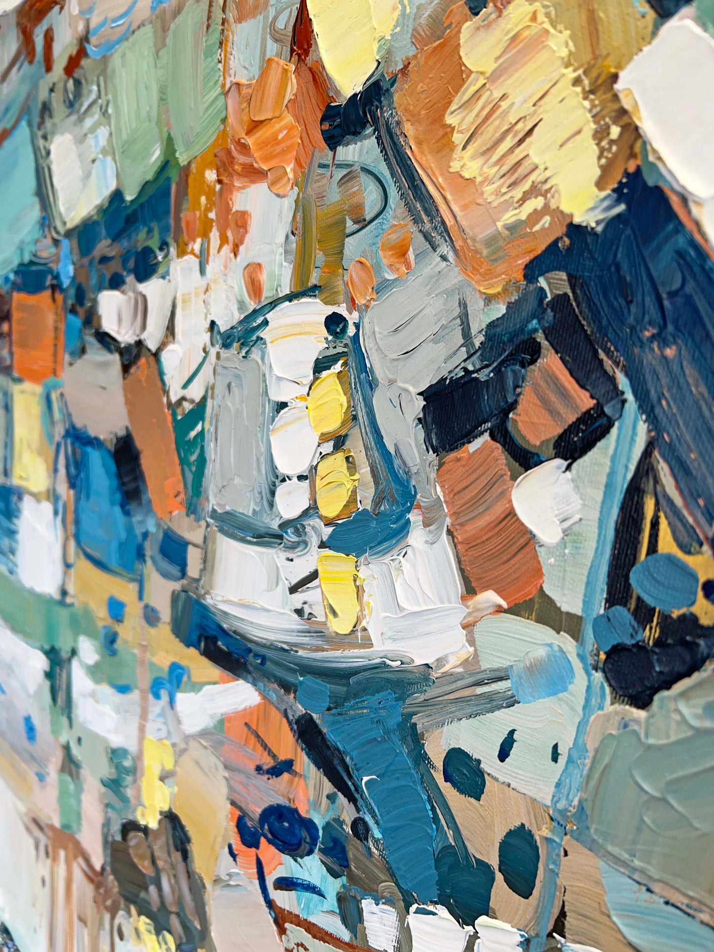 a close up of a painting with many different colors