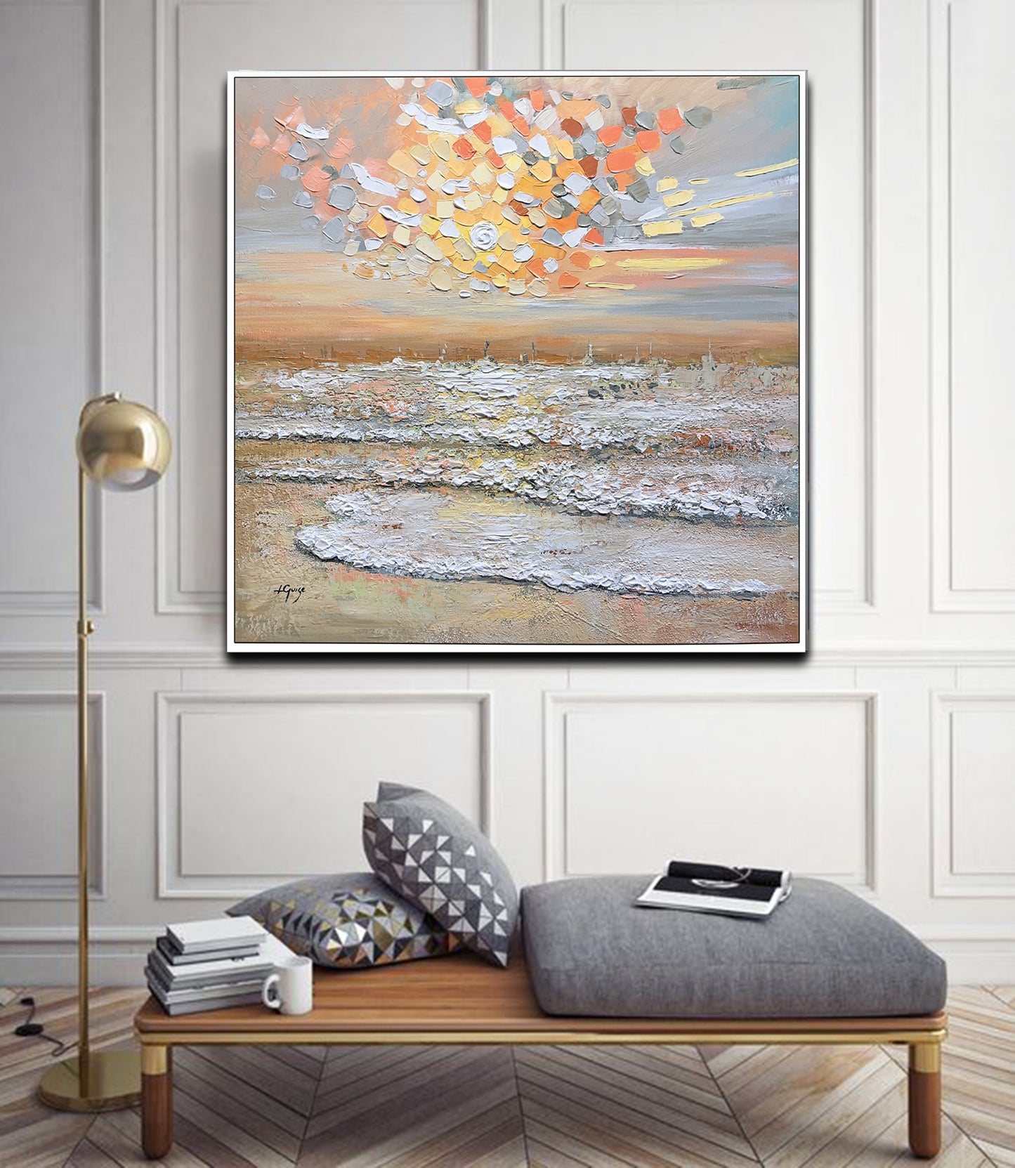 a living room with a couch and a painting on the wall