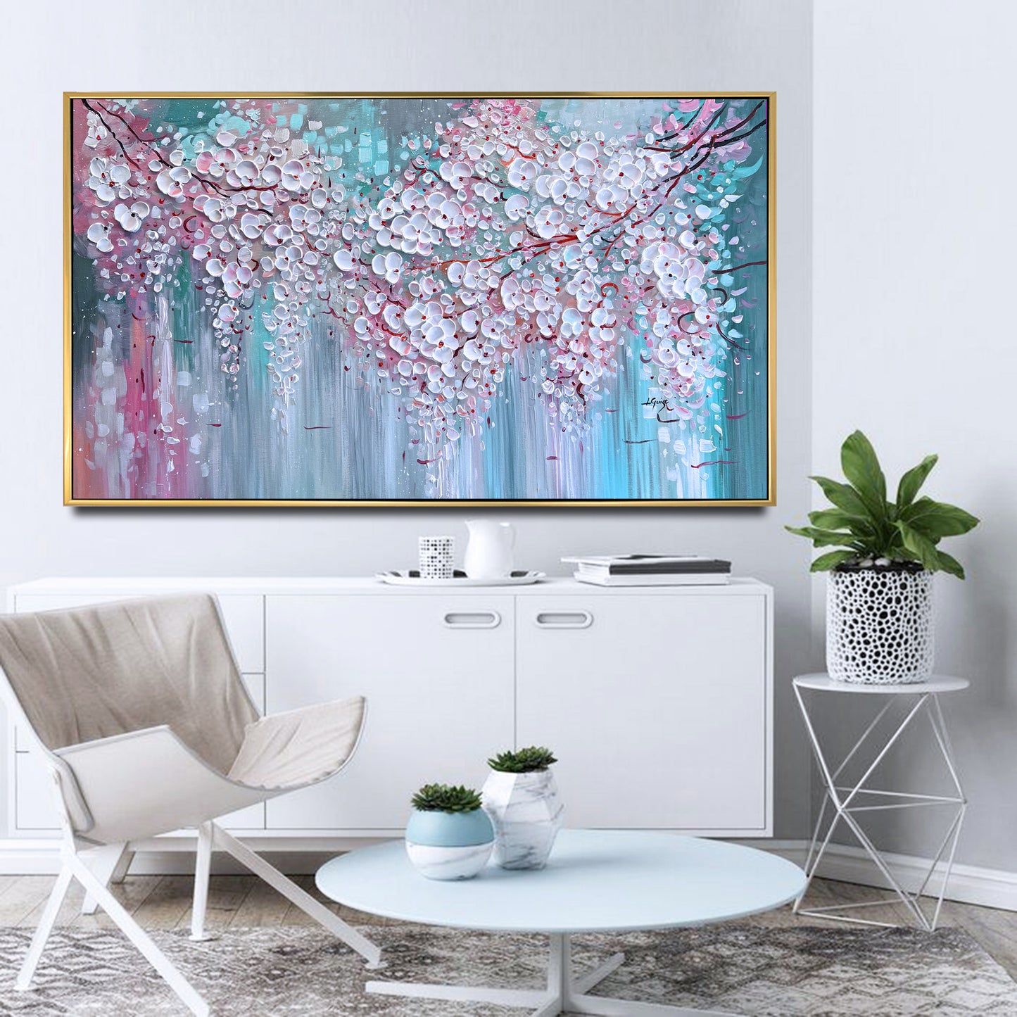 a living room with a painting on the wall