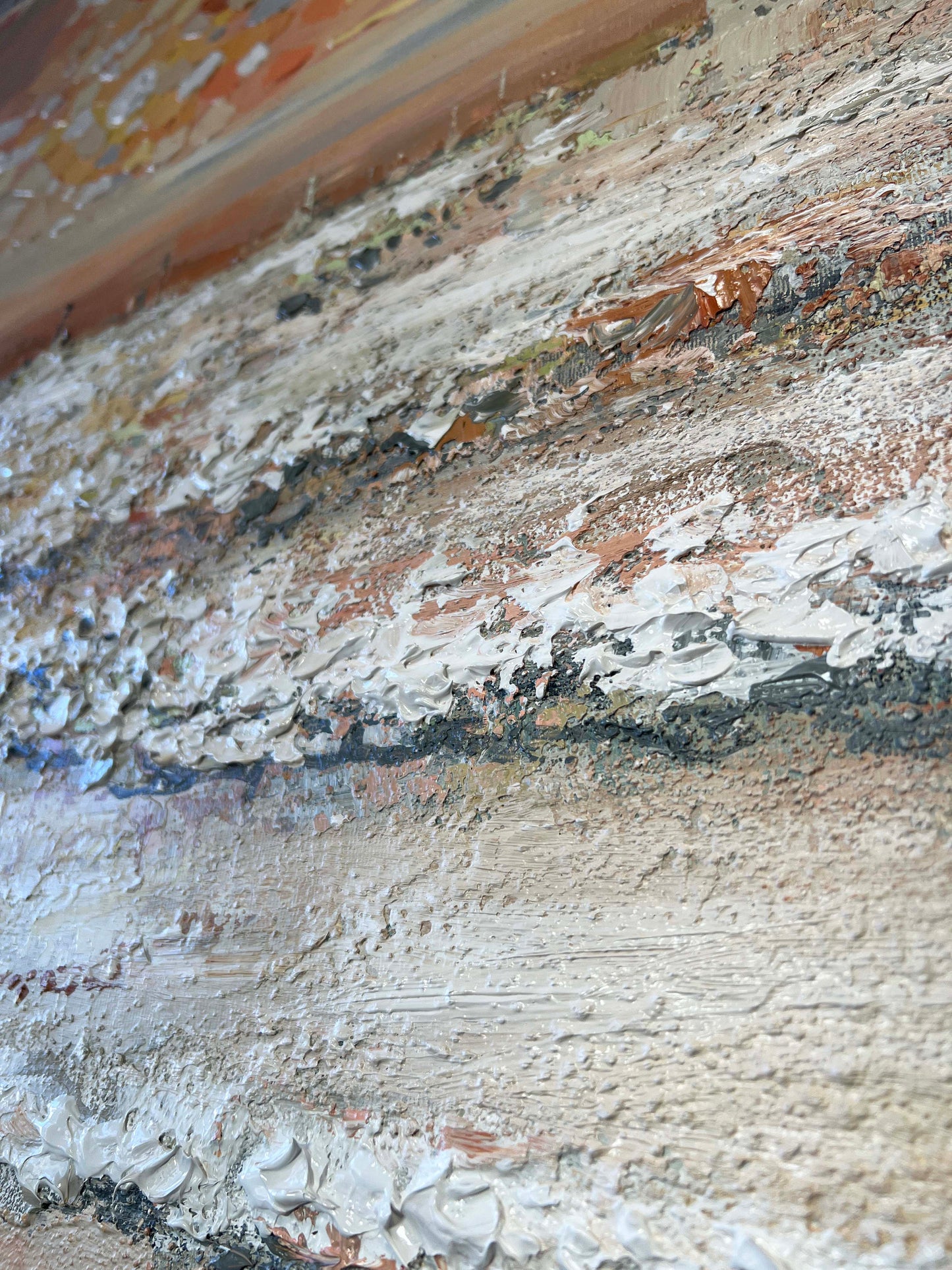 a close up of a piece of art on a wall