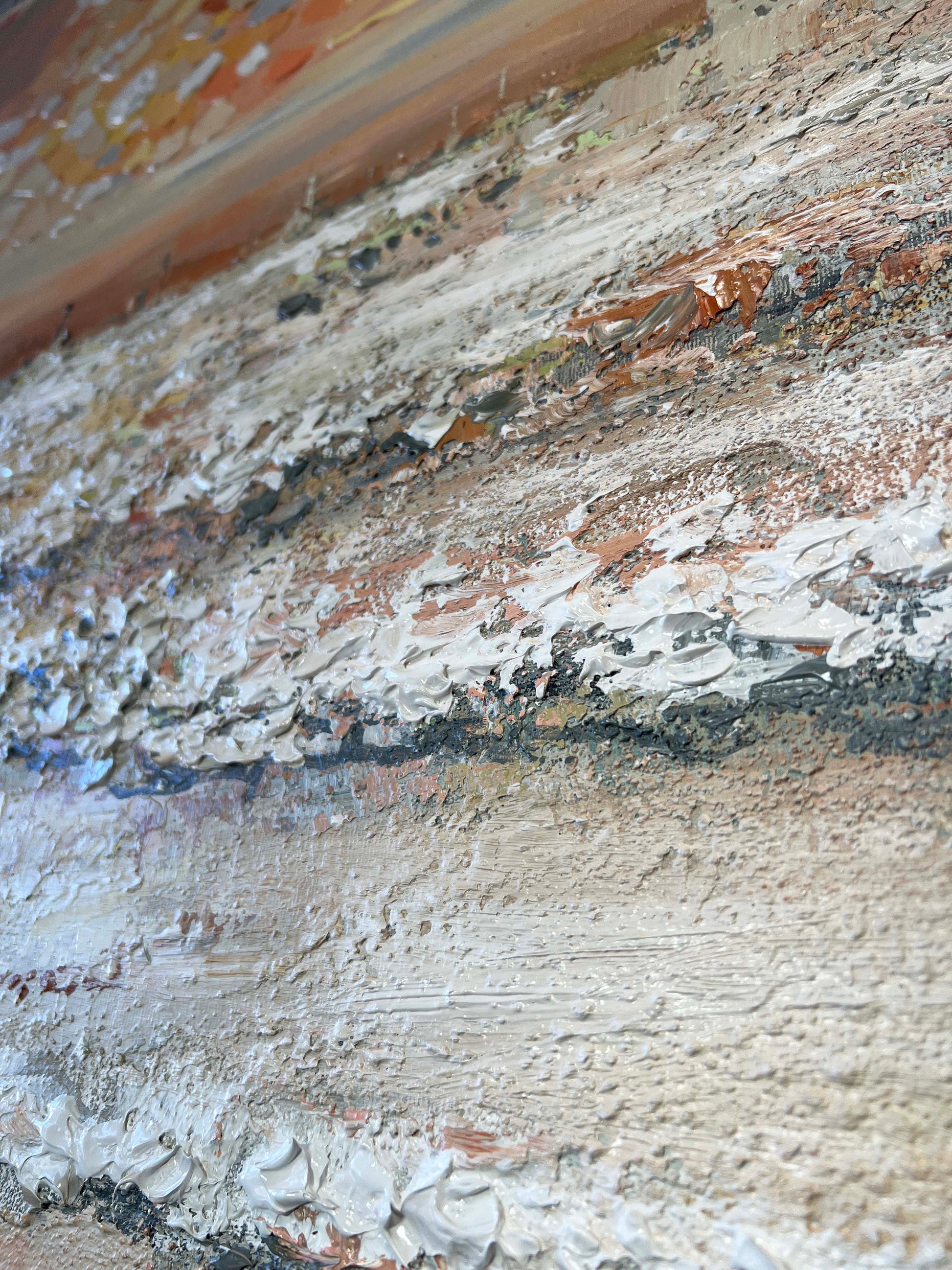 a close up of a piece of art on a wall