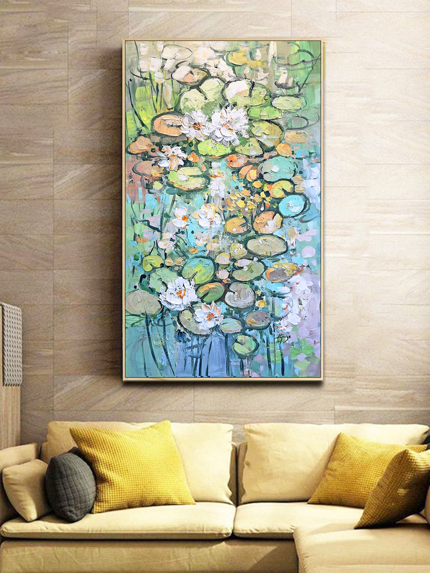 a living room with a couch and a painting on the wall