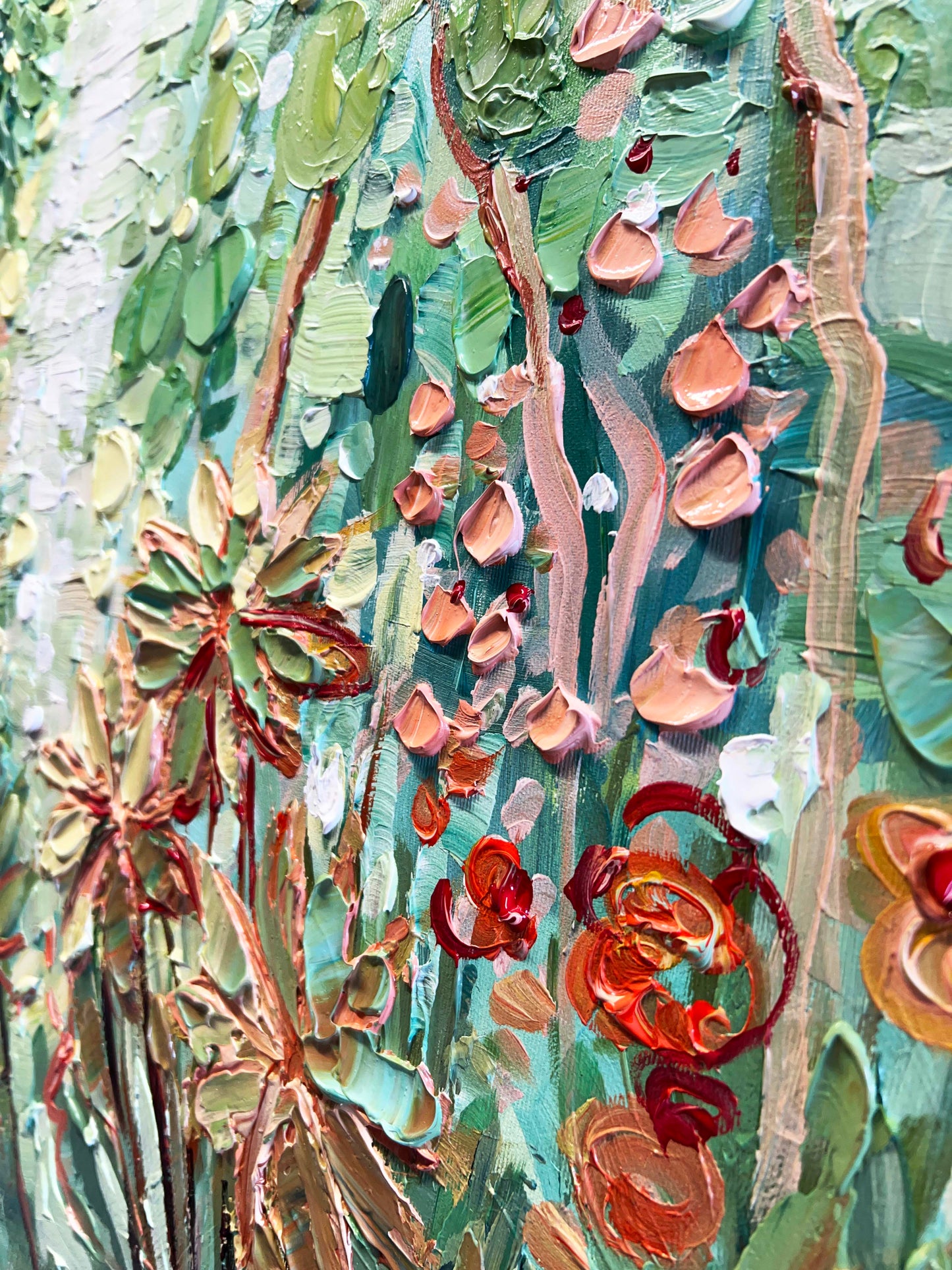 a close up of a painting of flowers