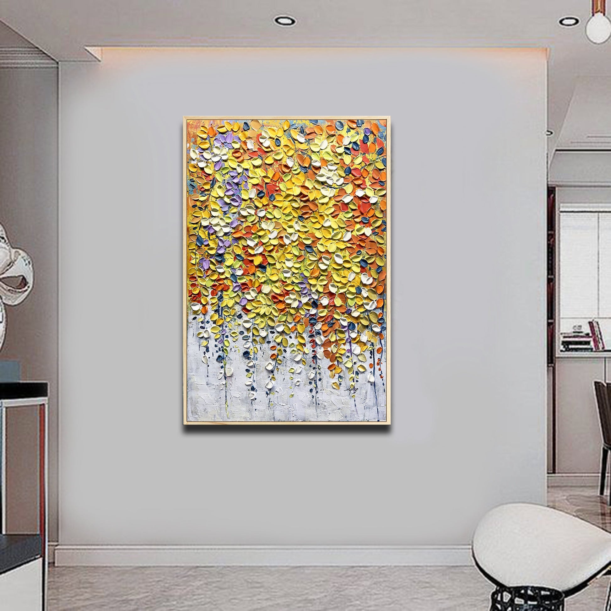 a painting hanging on a wall in a room