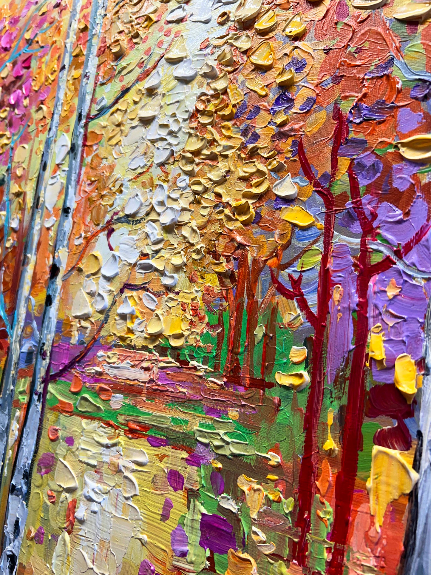 a painting of a colorful forest with lots of trees