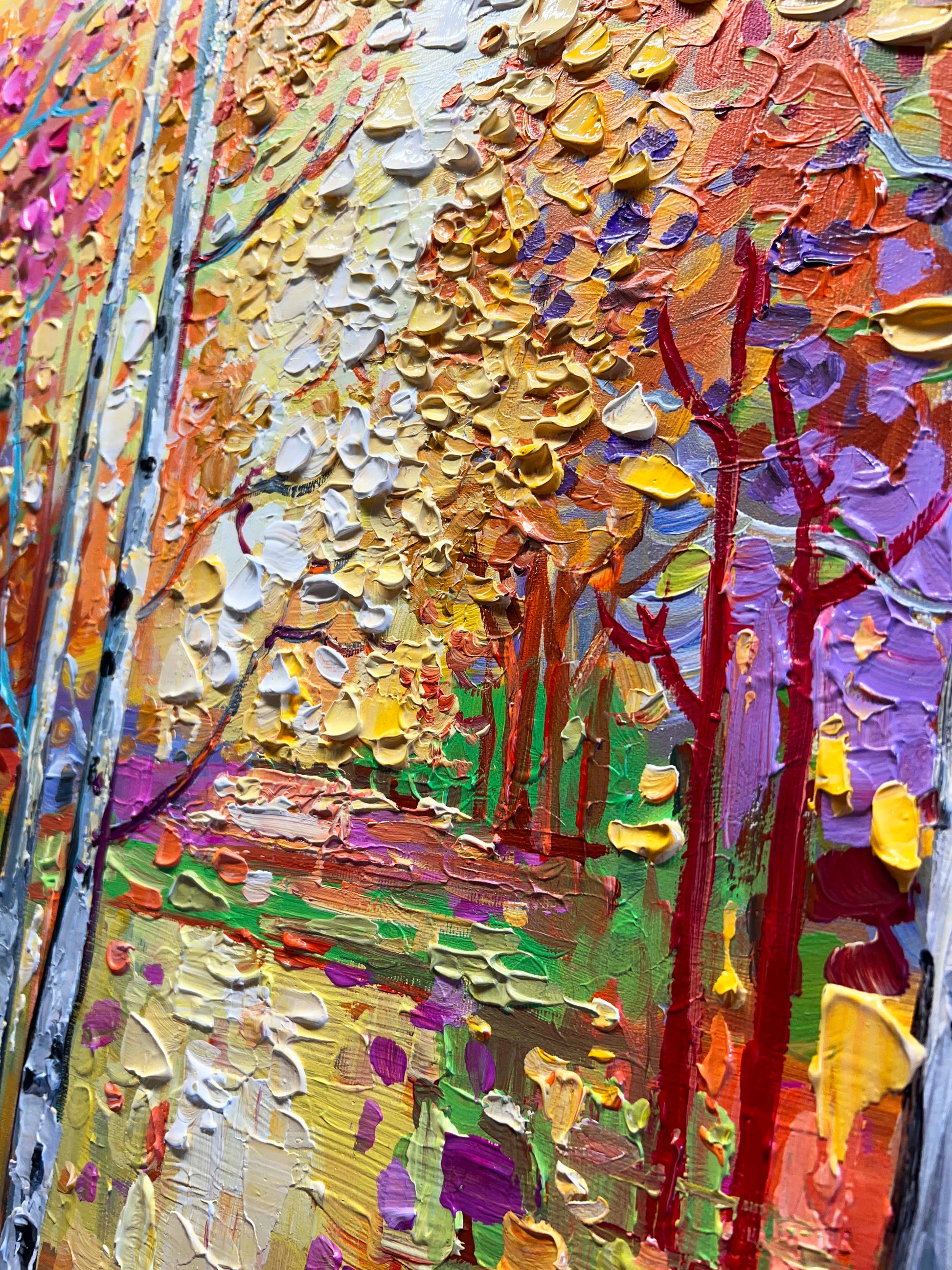 a painting of a colorful forest with lots of trees