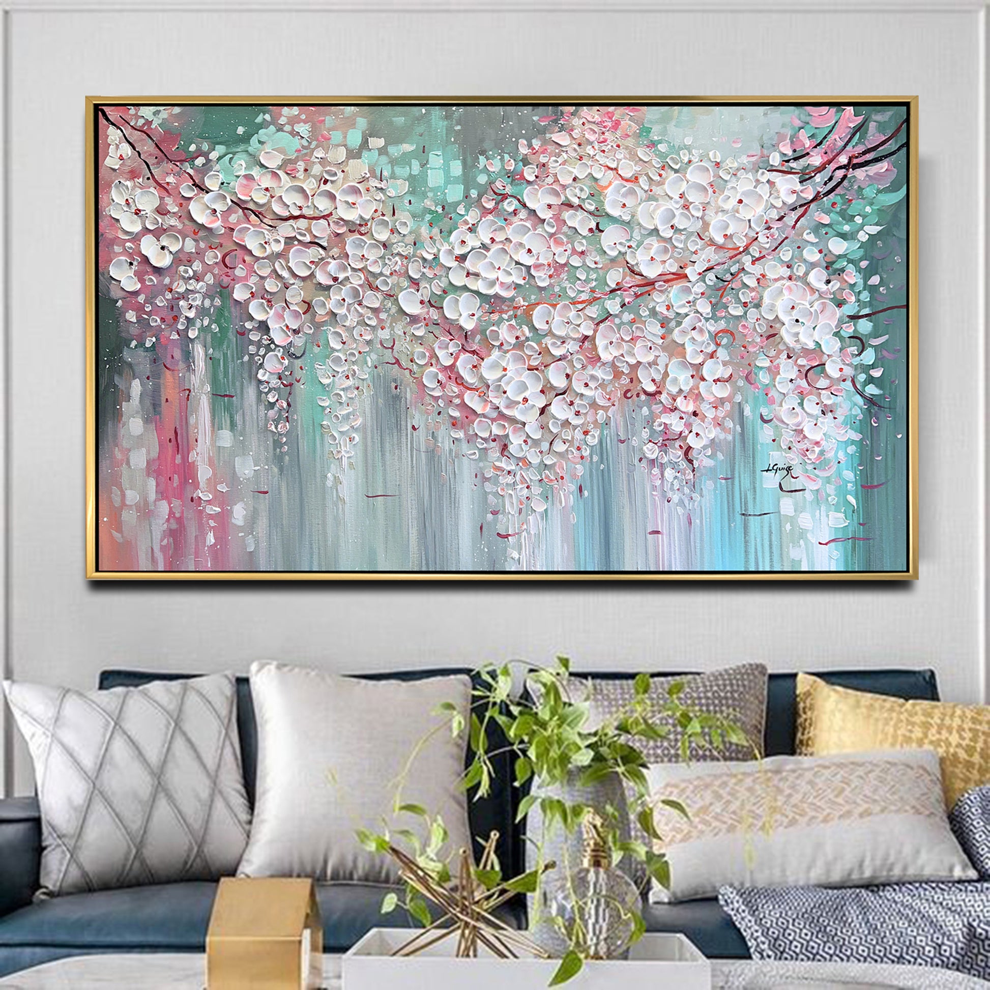 a living room filled with furniture and a painting on the wall