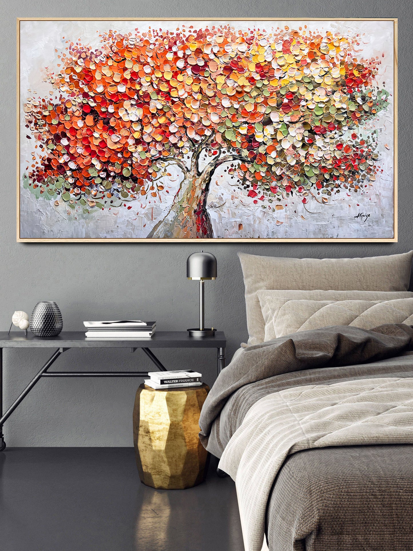 a bedroom with a bed and a painting on the wall