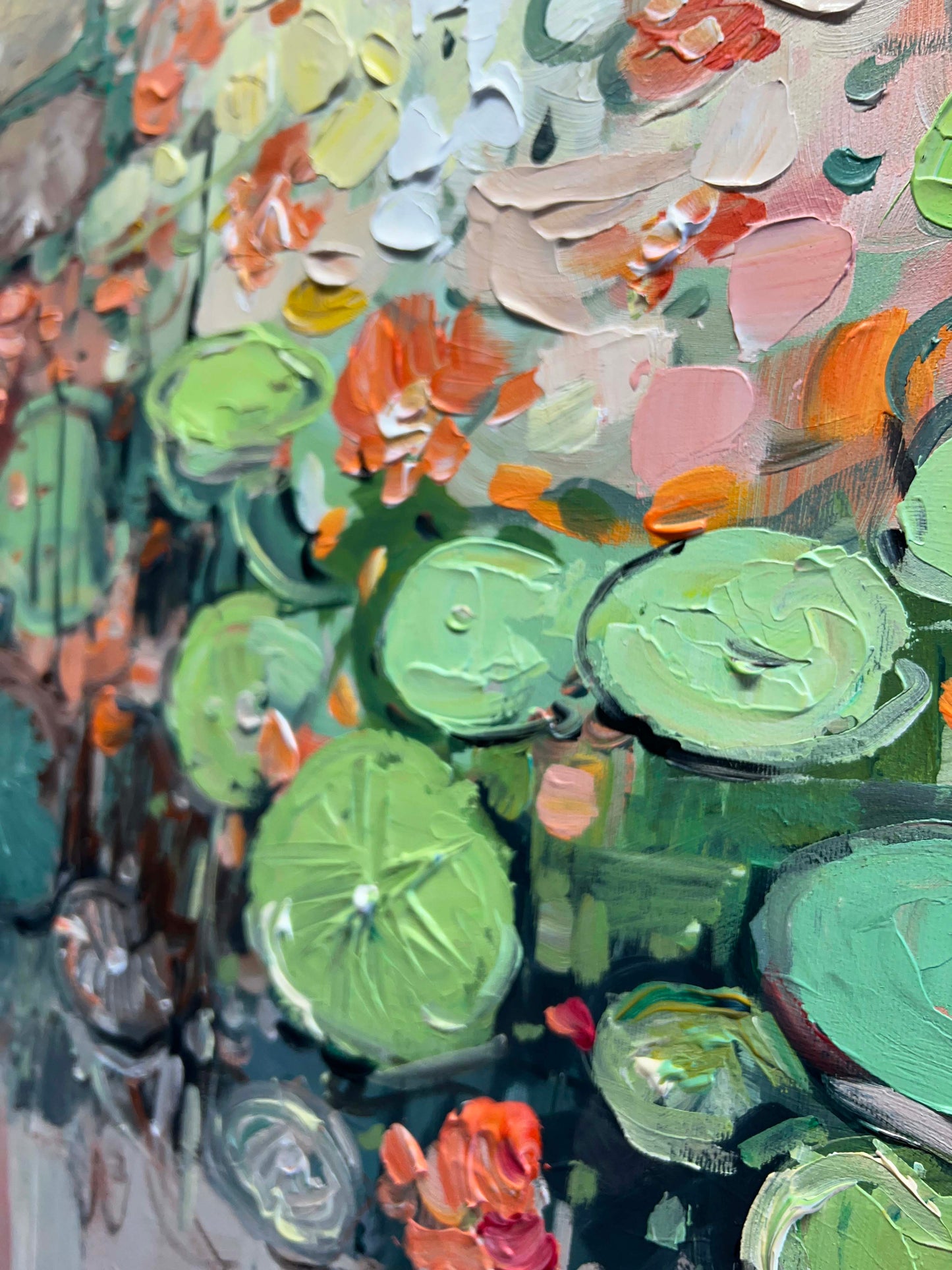 a painting of water lilies in a pond