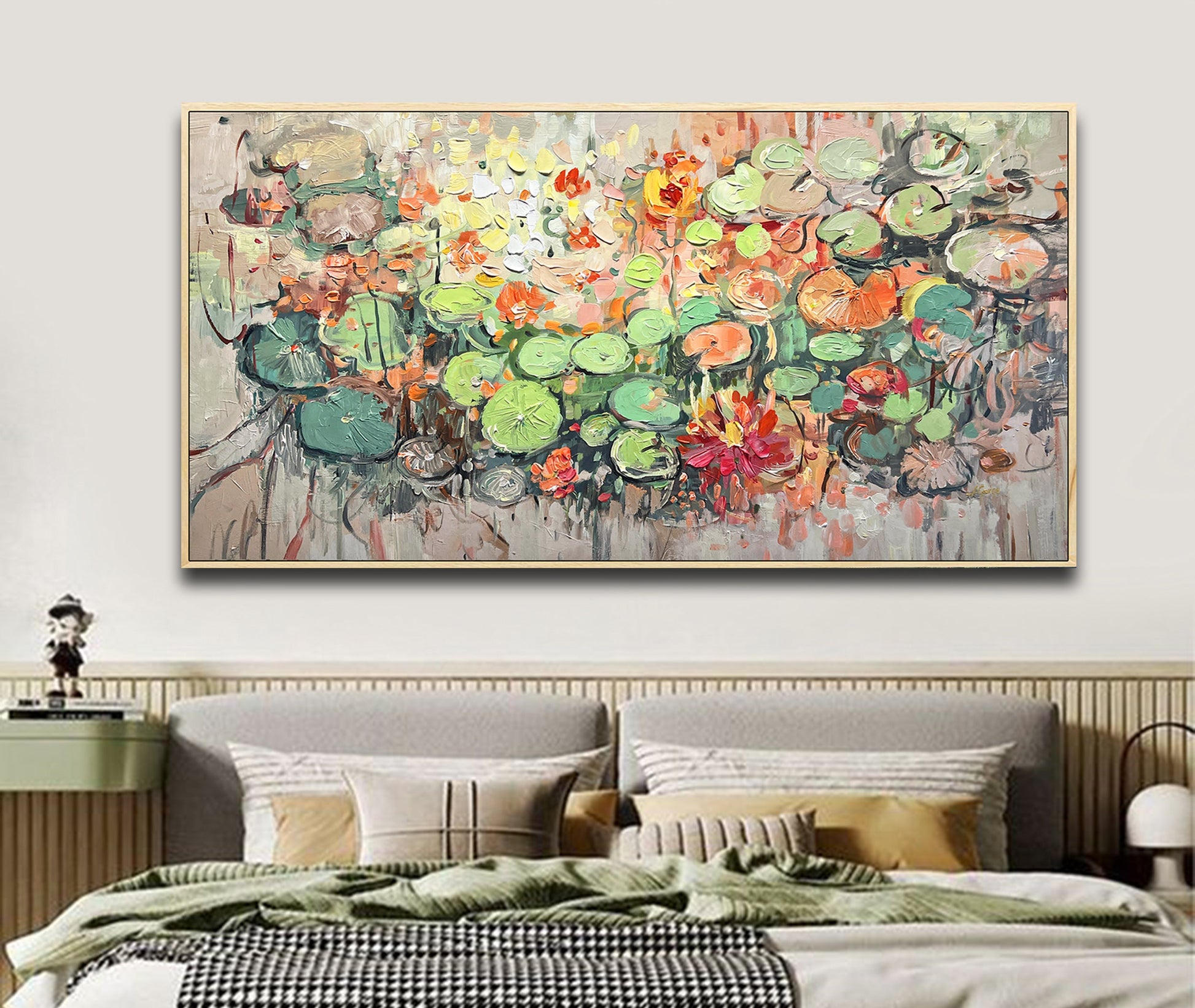 a large painting on a wall above a bed