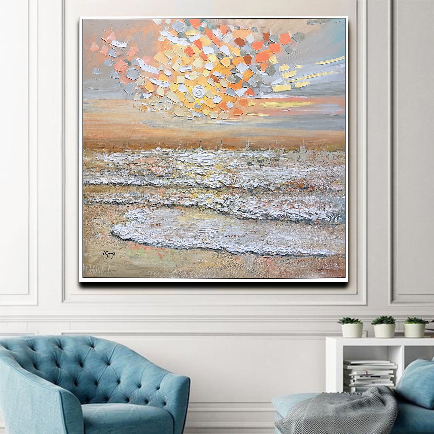 a living room with a blue chair and a painting on the wall