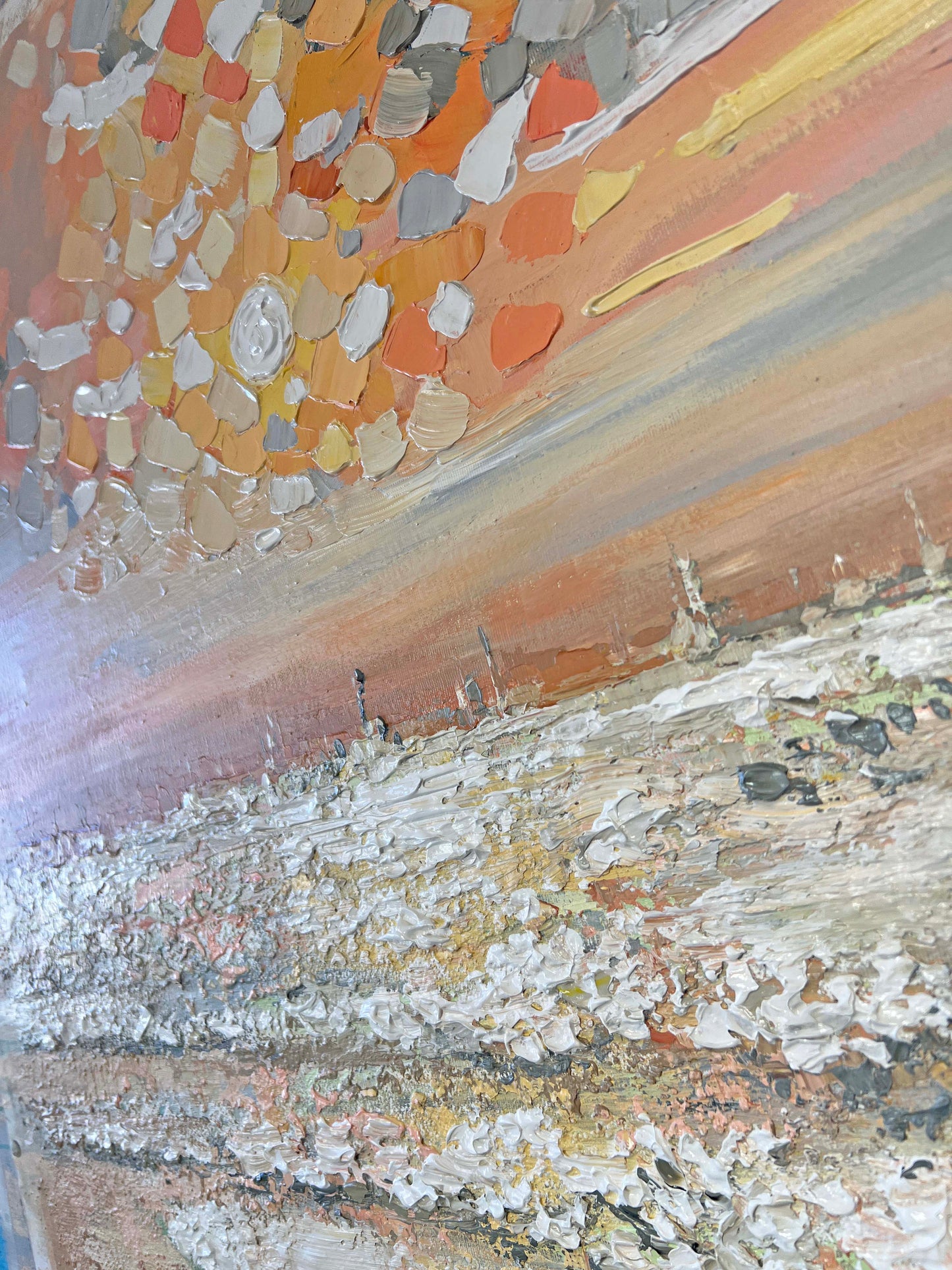 a painting of a beach with a sky in the background