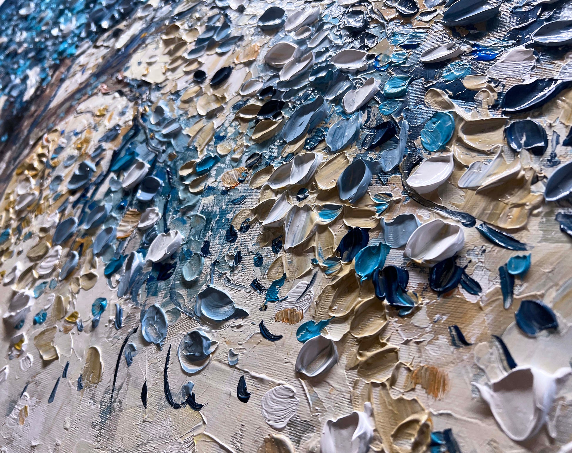 a close up of a piece of art made out of broken glass