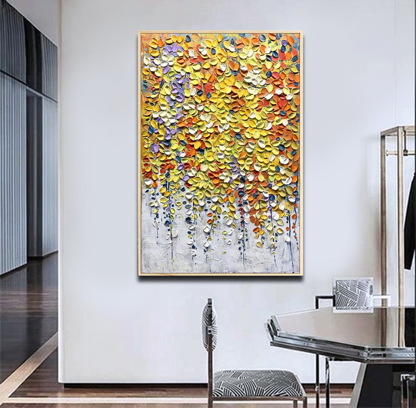 a painting hanging on a wall in a room