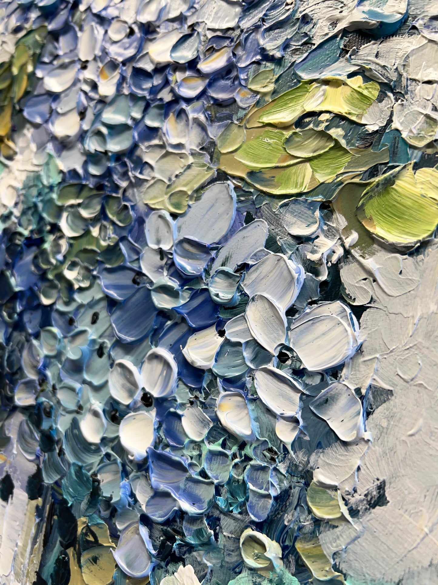 a close up of a piece of art with paint on it