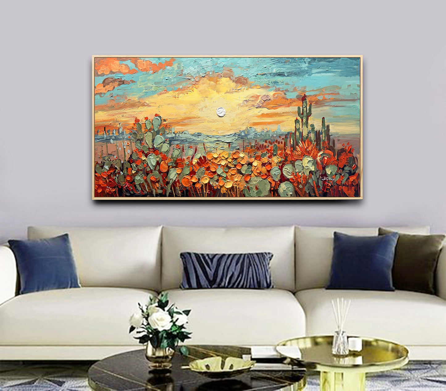 a living room with a couch and a painting on the wall