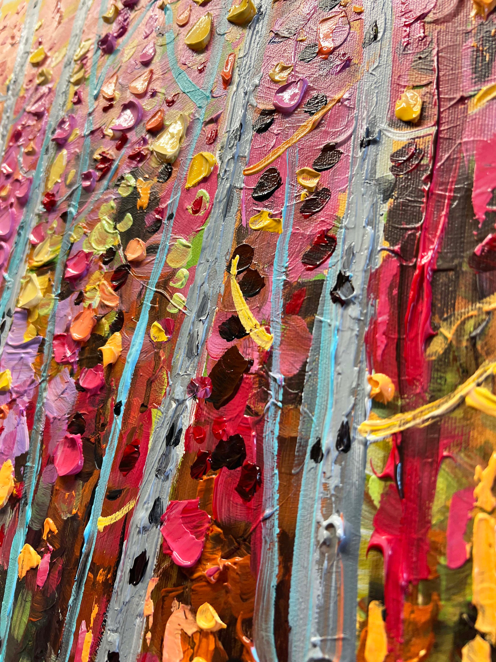 a close up of a painting with many colors