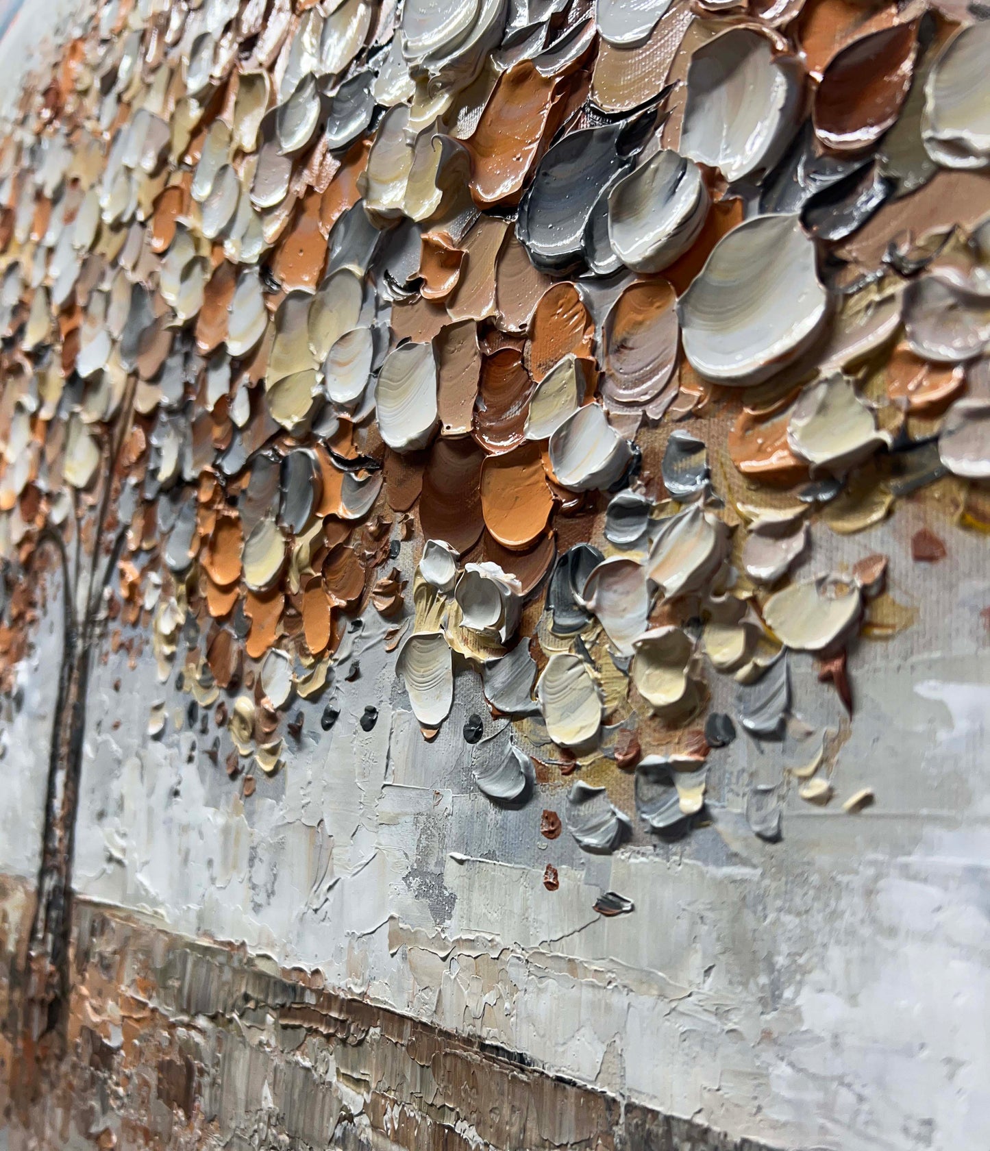 a large piece of art that is on the side of a building
