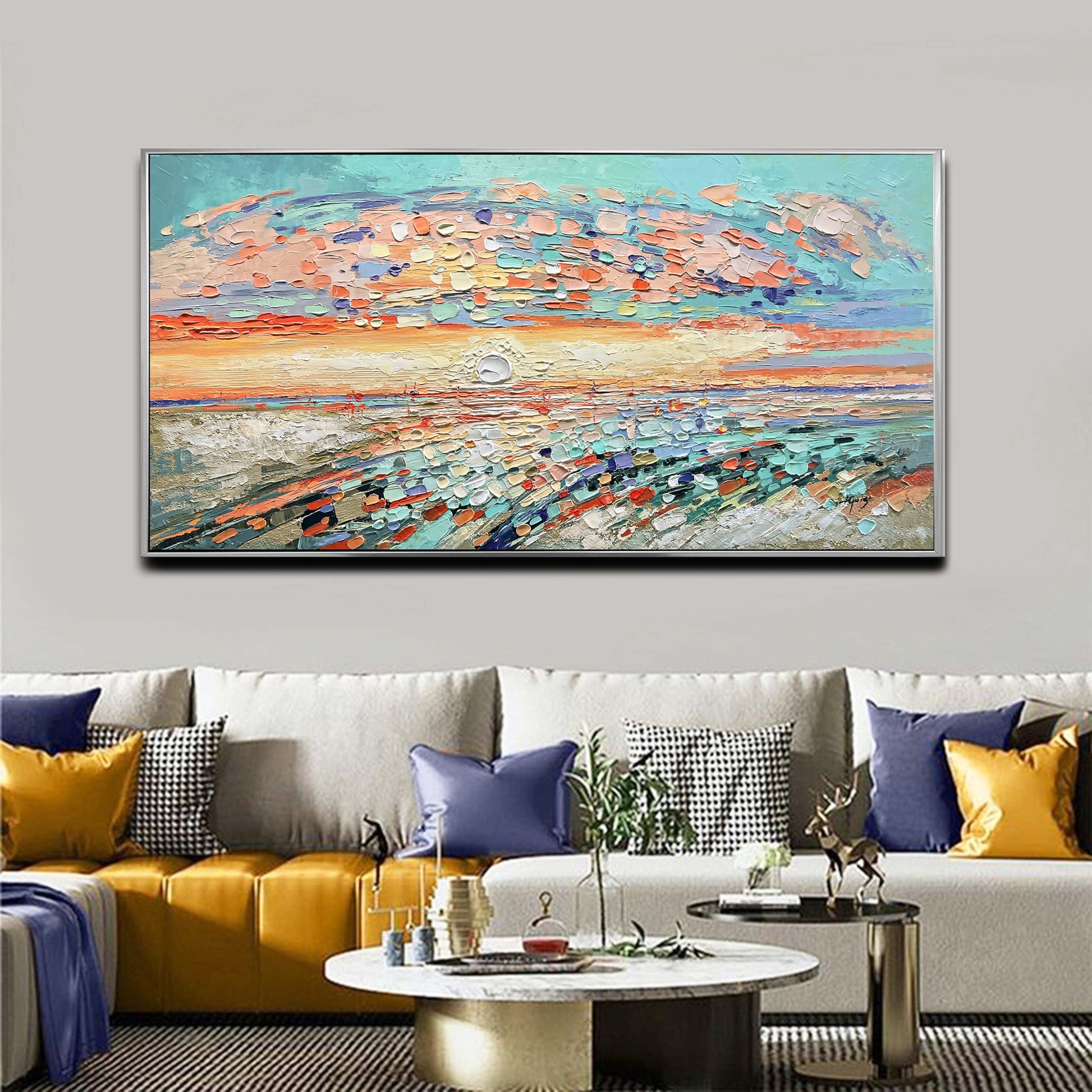 a living room with a large painting on the wall