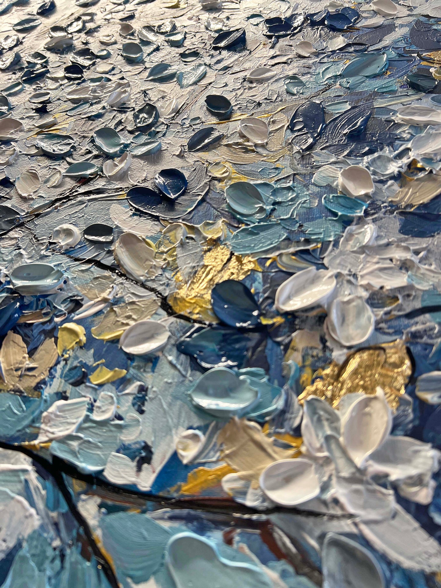 a close up of a painting with water drops on it