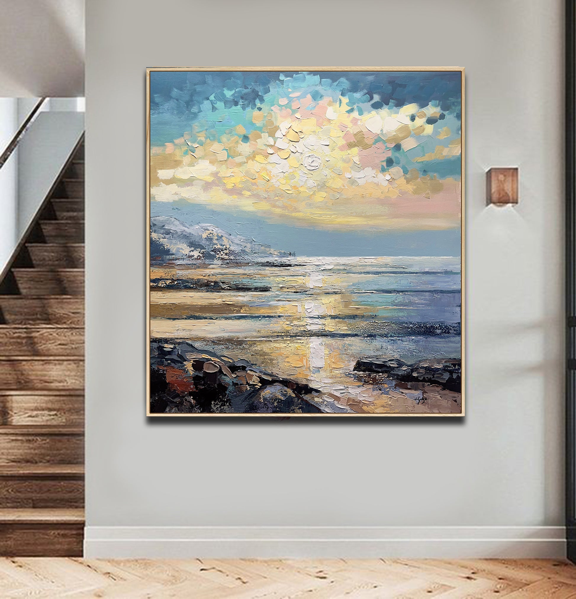 a painting hanging on a wall next to a stair case