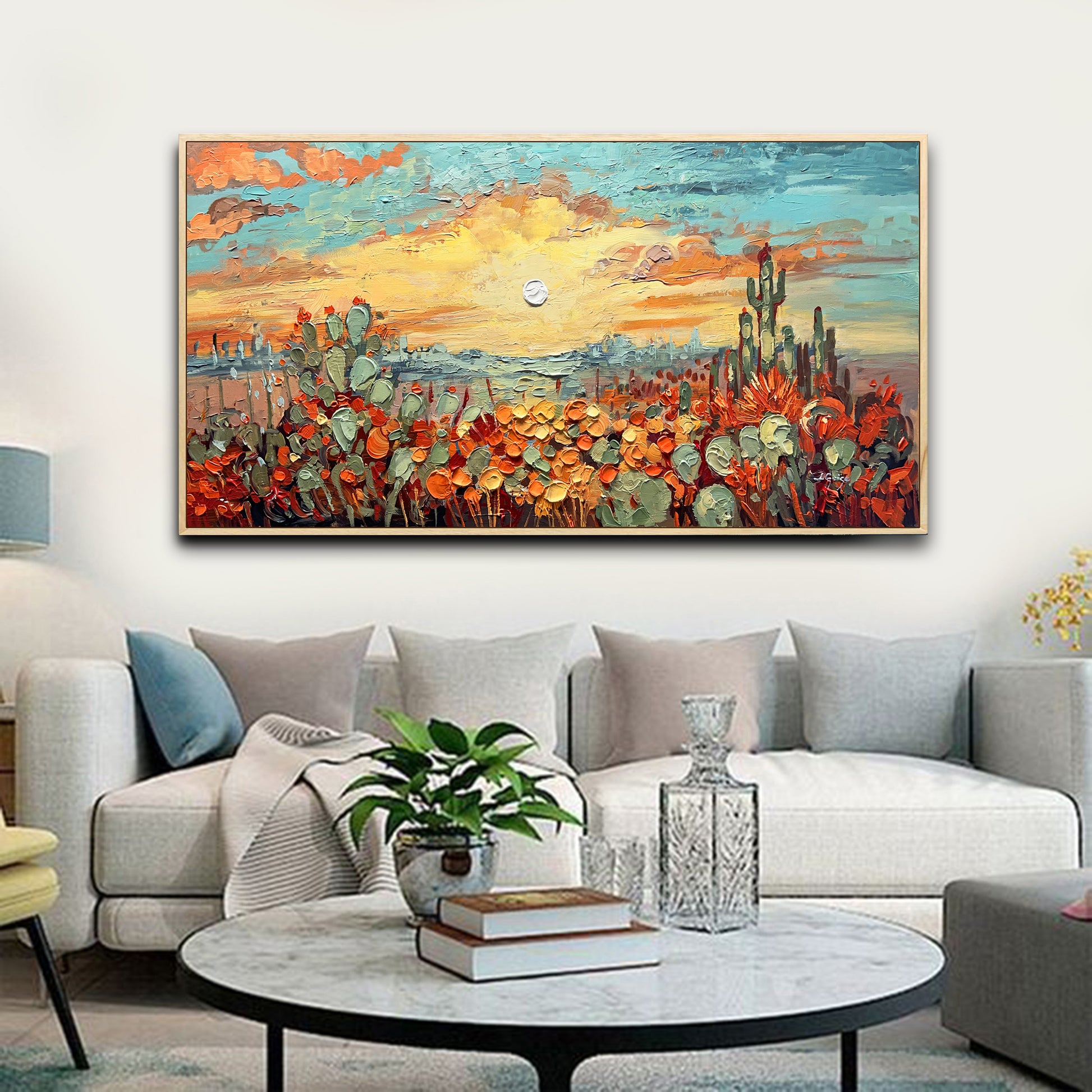 a living room filled with furniture and a painting on the wall