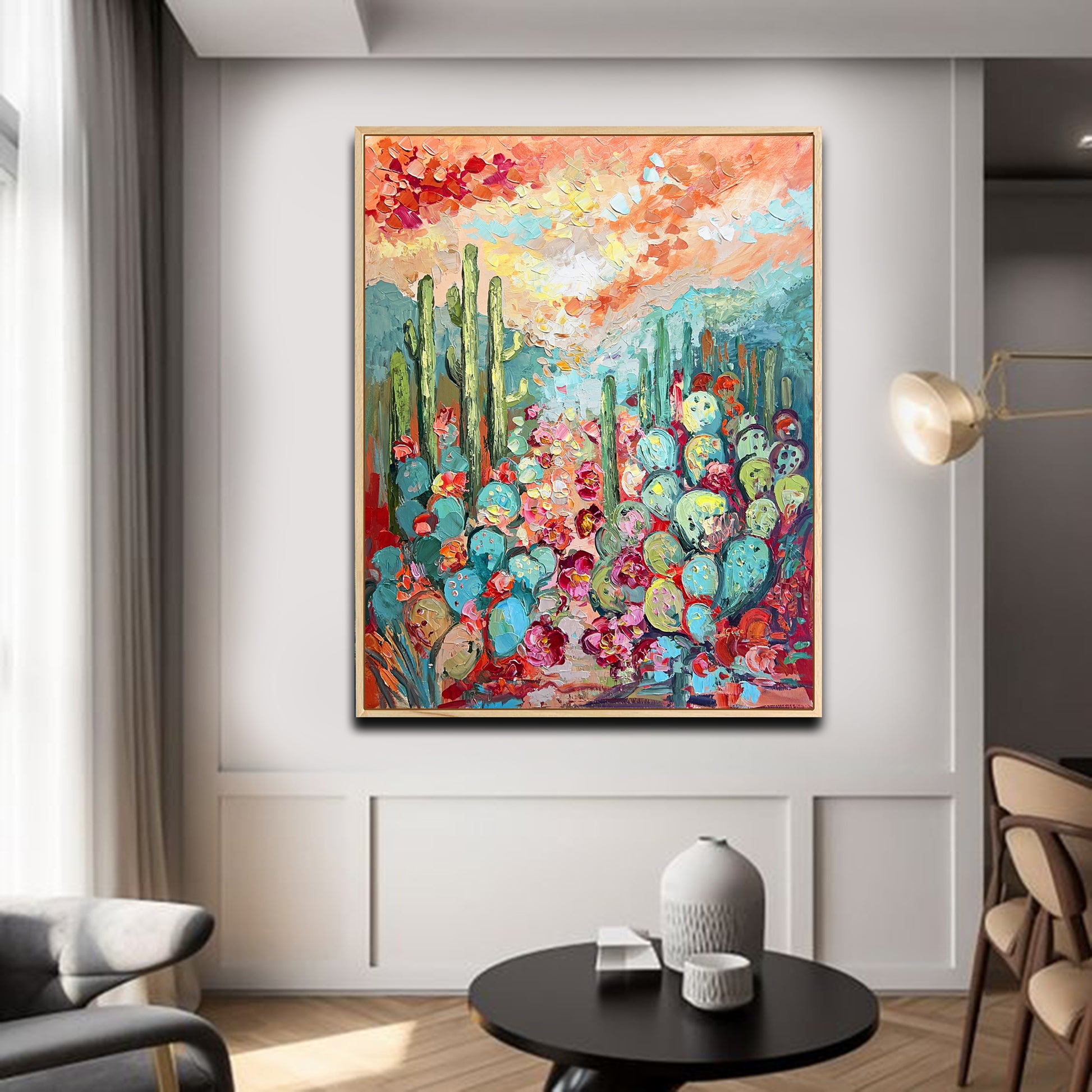 a living room with a painting on the wall