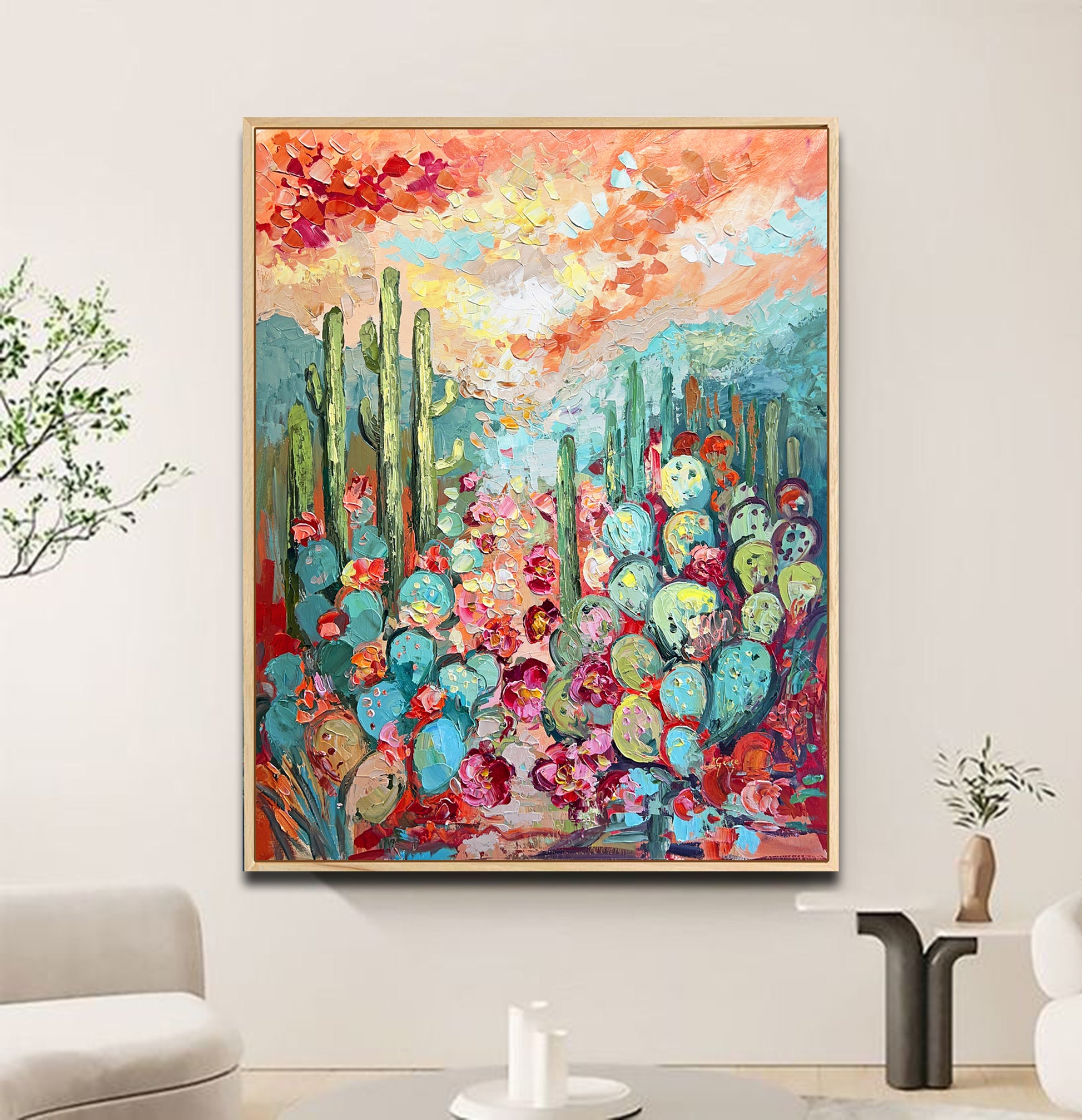 a living room with a couch and a painting on the wall