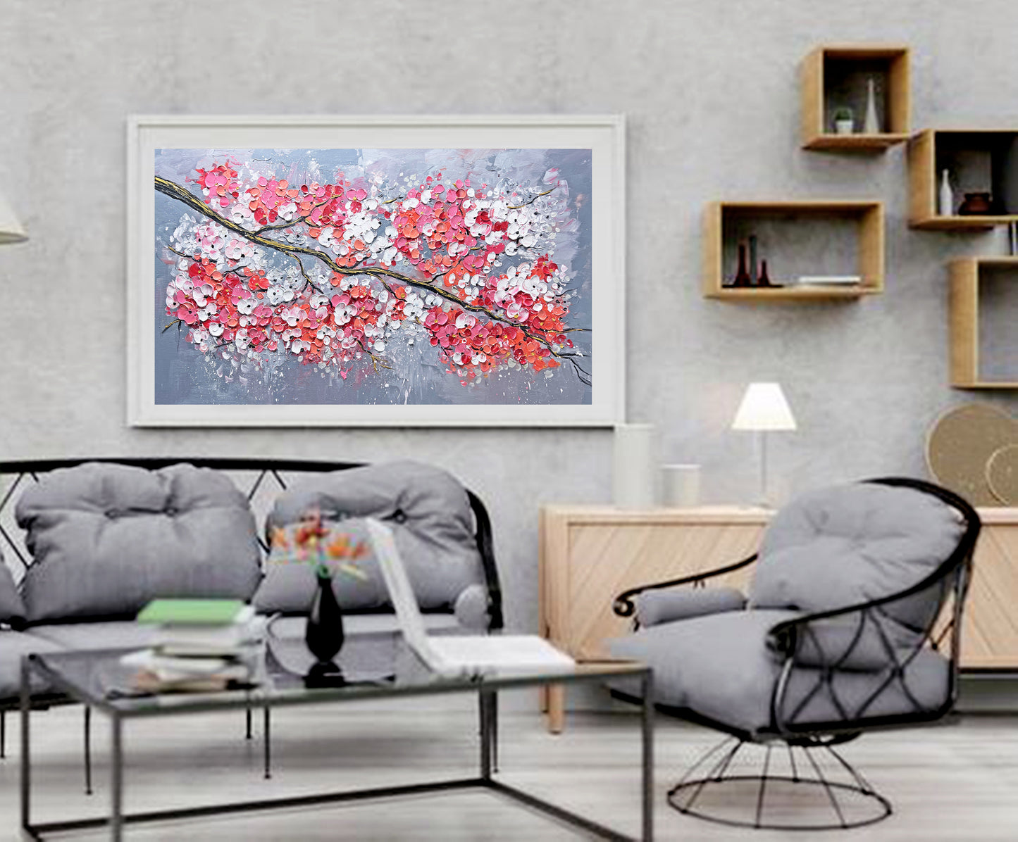 a living room filled with furniture and a painting on the wall