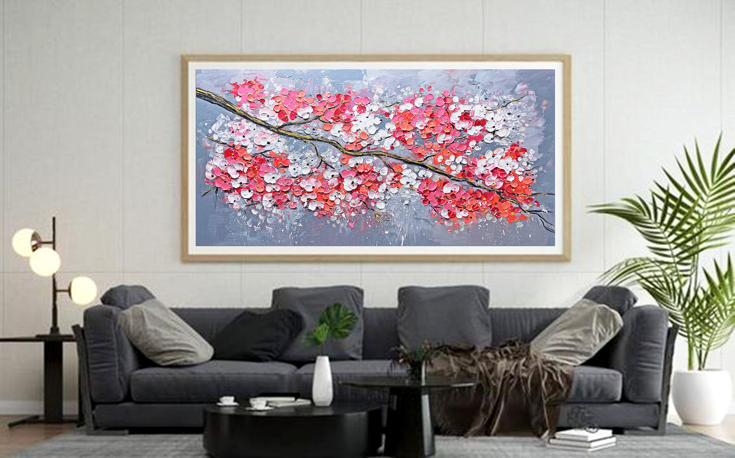 a living room filled with furniture and a painting on the wall