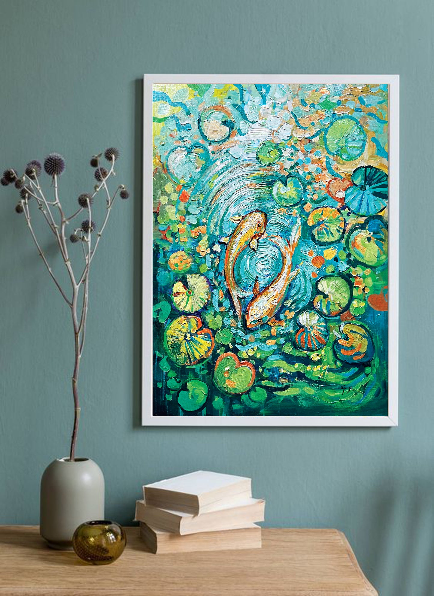 a painting hanging on a wall above a table