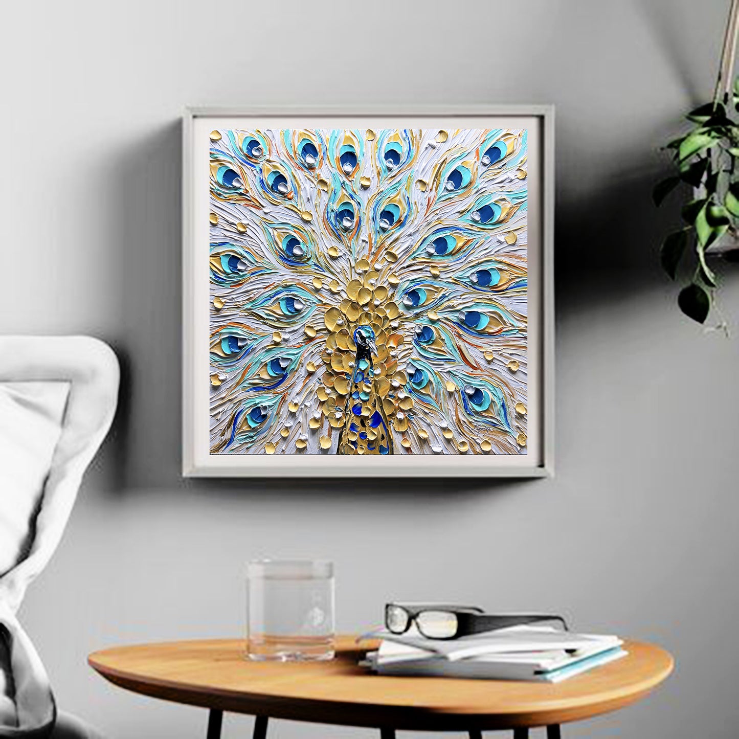 a picture of a peacock is hanging on a wall