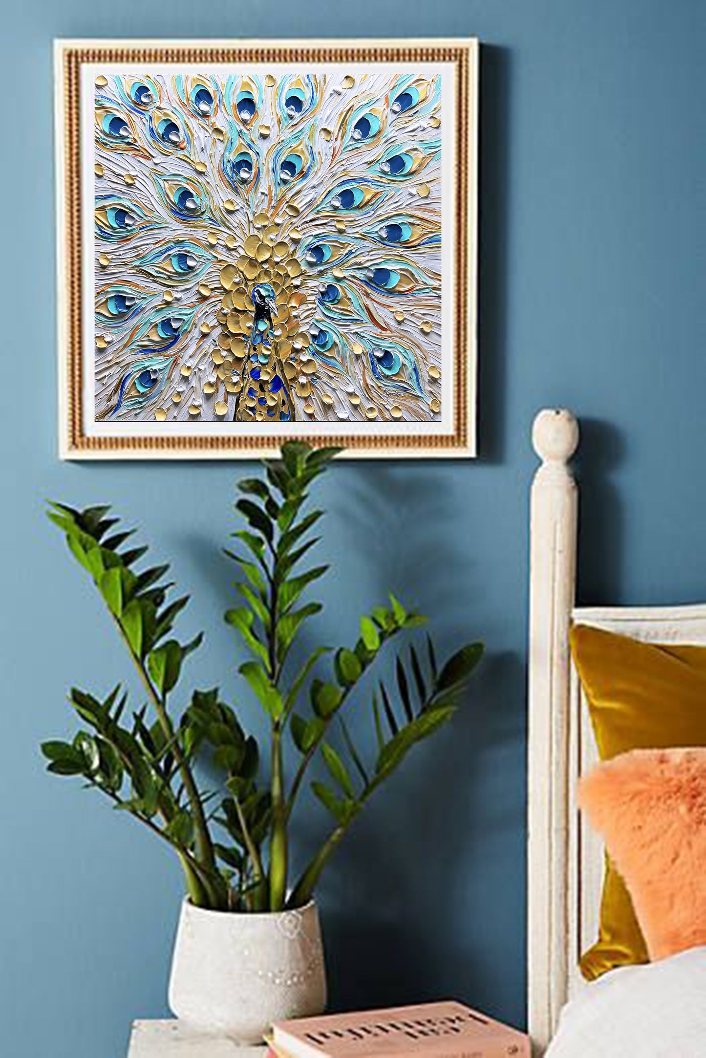 a bedroom with blue walls and a painting on the wall